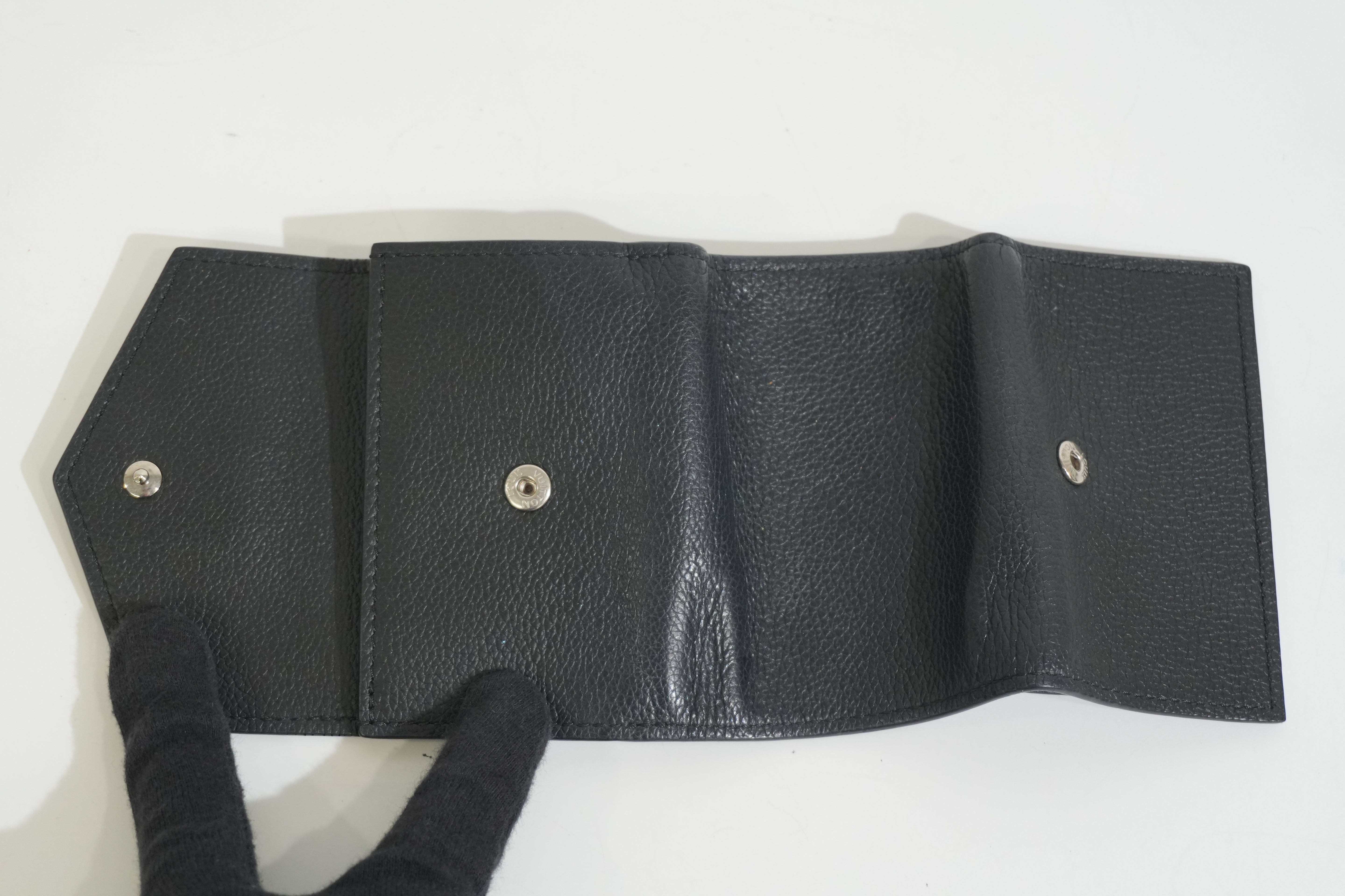 Pre-owned Louis Vuitton Leather Lock Mini Wallet Black