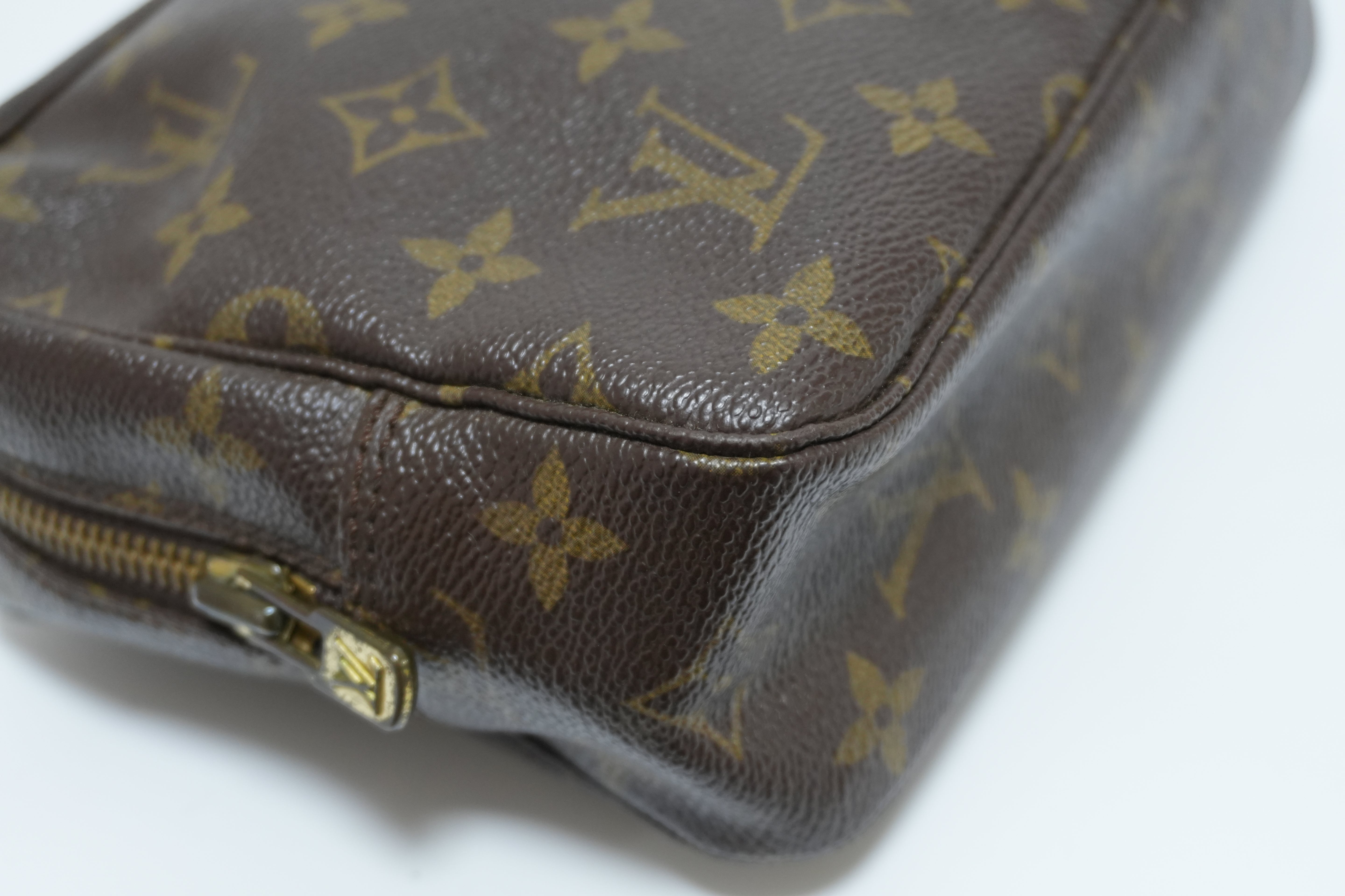 Louis Vuitton Monogram Trousse 23 Canvas Used