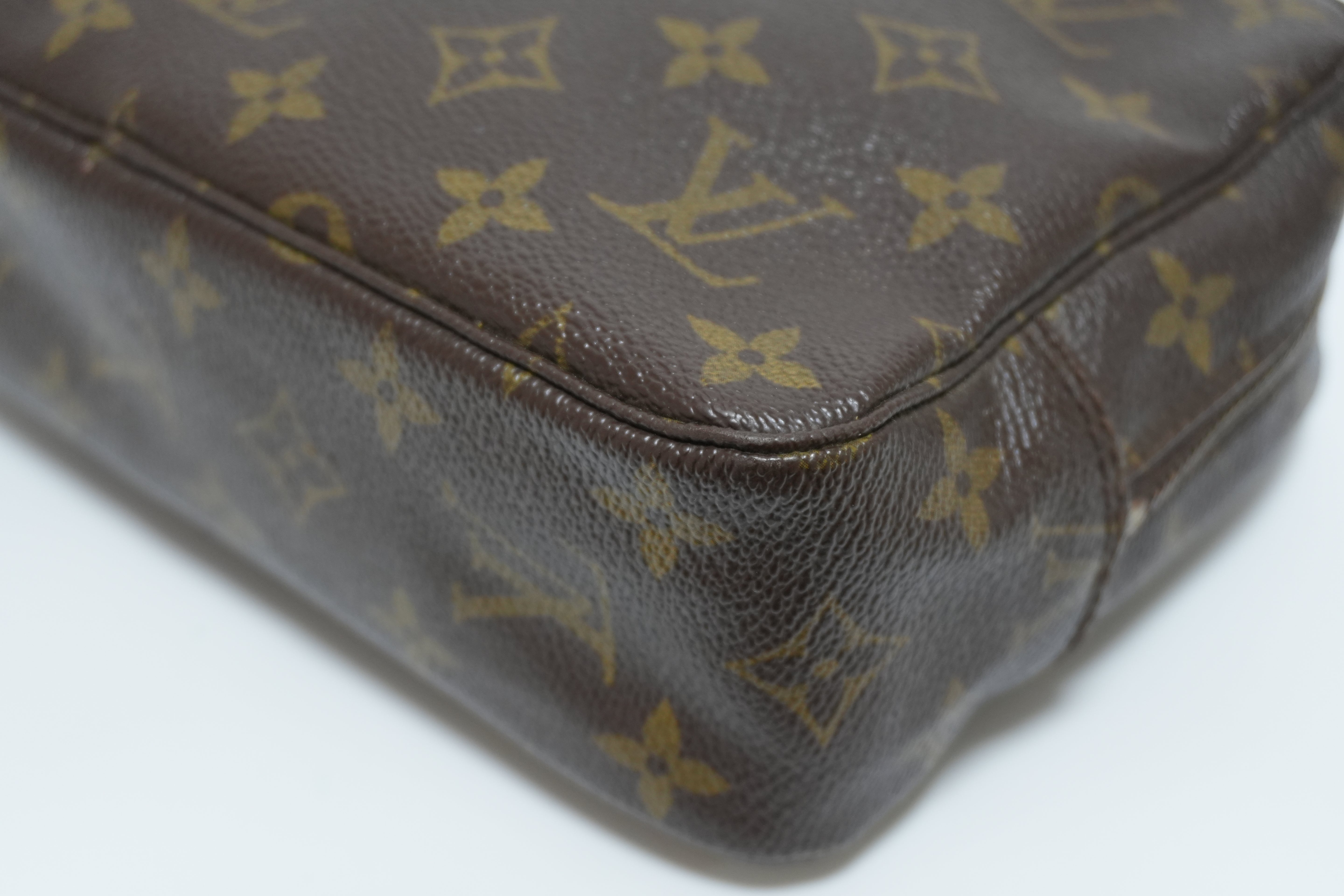 Louis Vuitton Monogram Trousse 23 Canvas Used