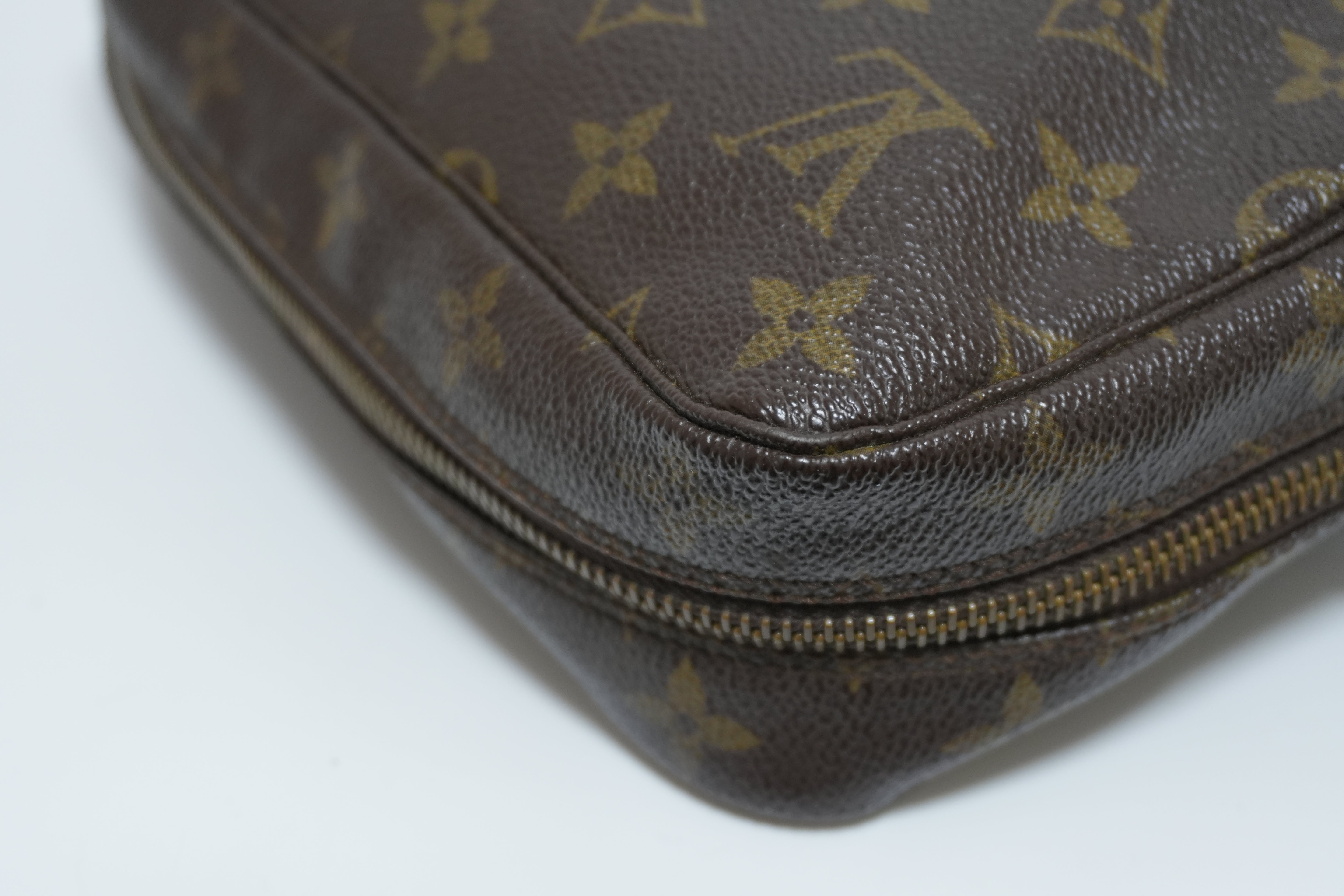 Louis Vuitton Monogram Trousse 23 Canvas Used