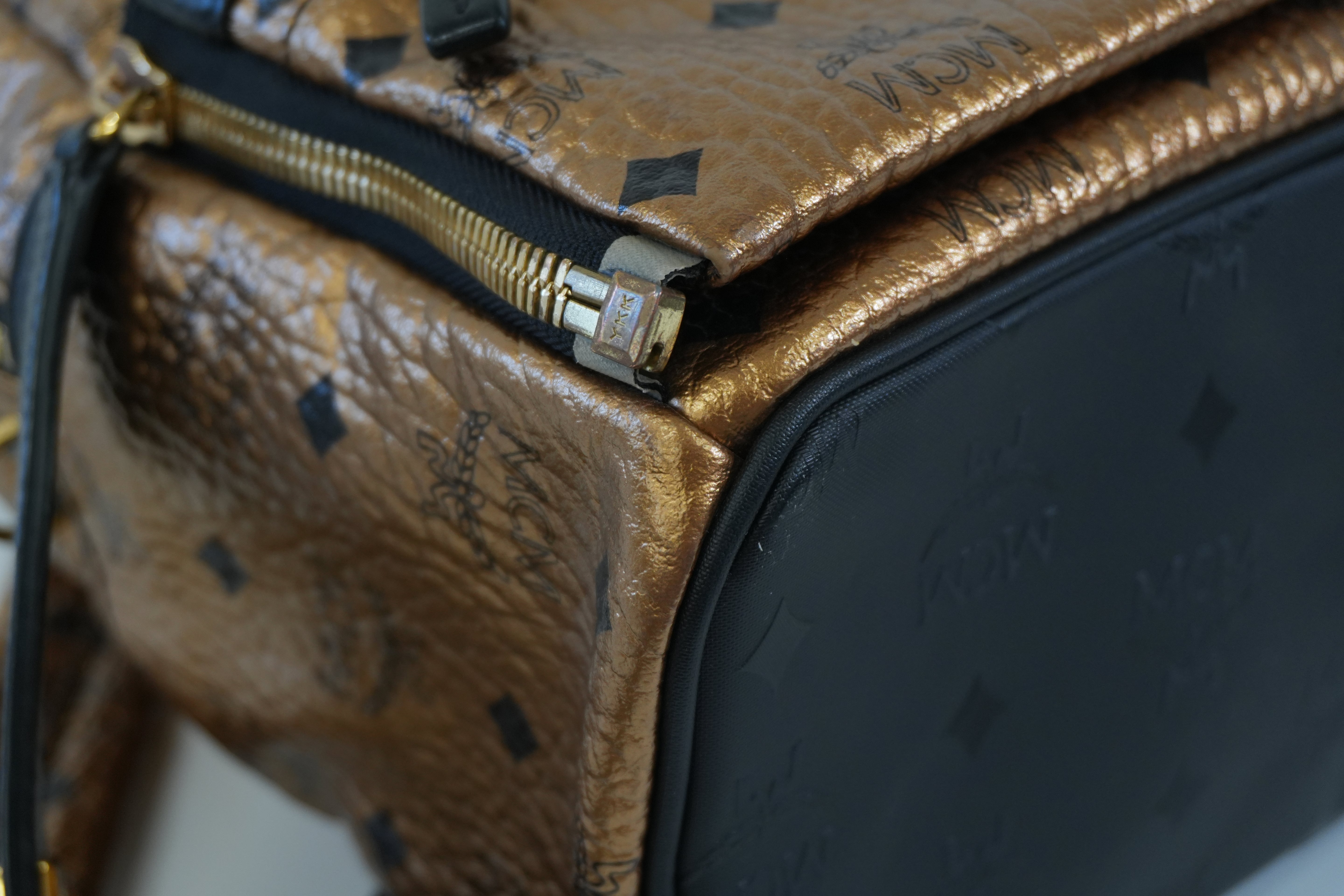 Pre-owned MCM Metallic Backpack with Detachable Pouch Gold