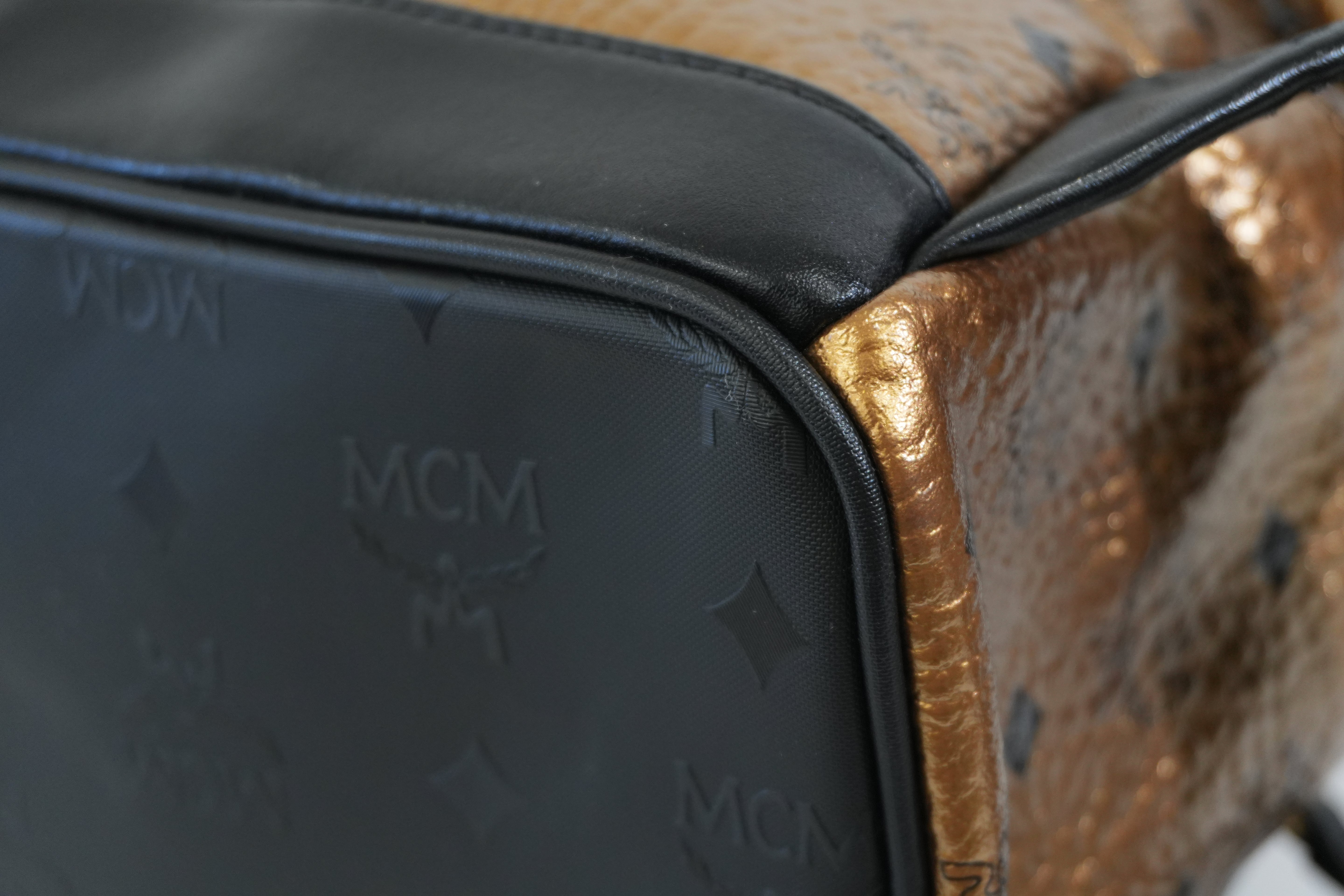 Pre-owned MCM Metallic Backpack with Detachable Pouch Gold