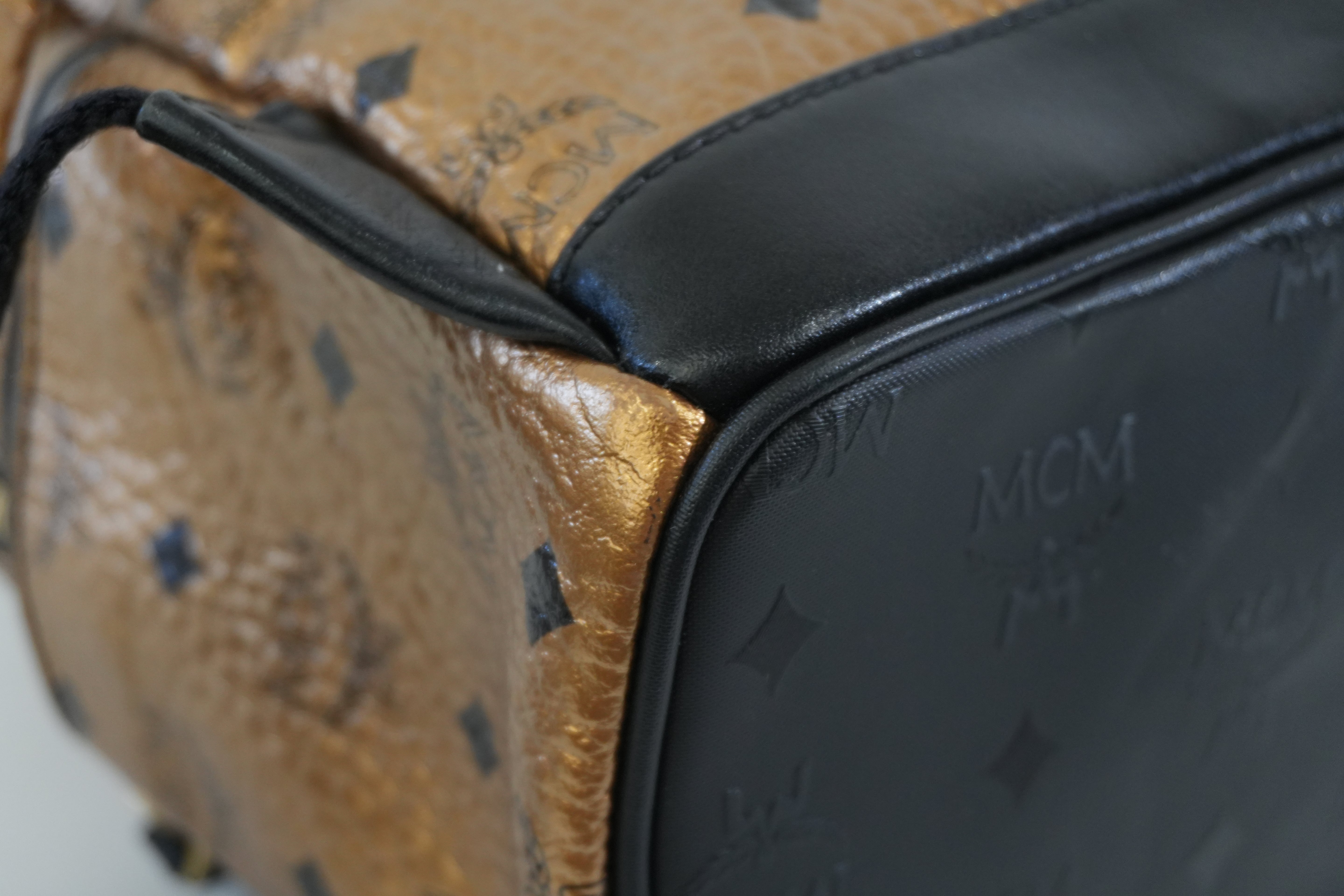 Pre-owned MCM Metallic Backpack with Detachable Pouch Gold