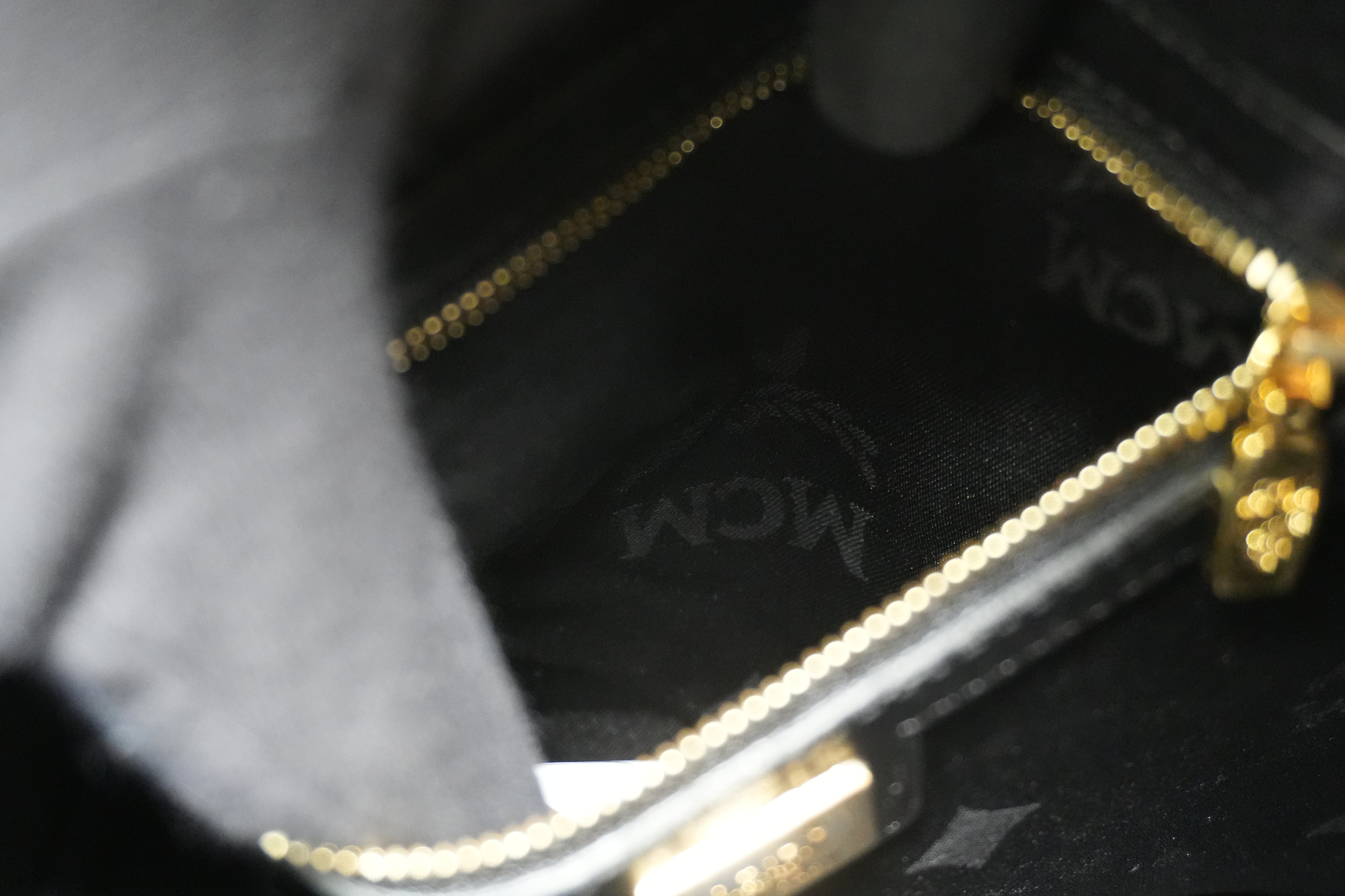 Pre-owned MCM Metallic Backpack with Detachable Pouch Gold