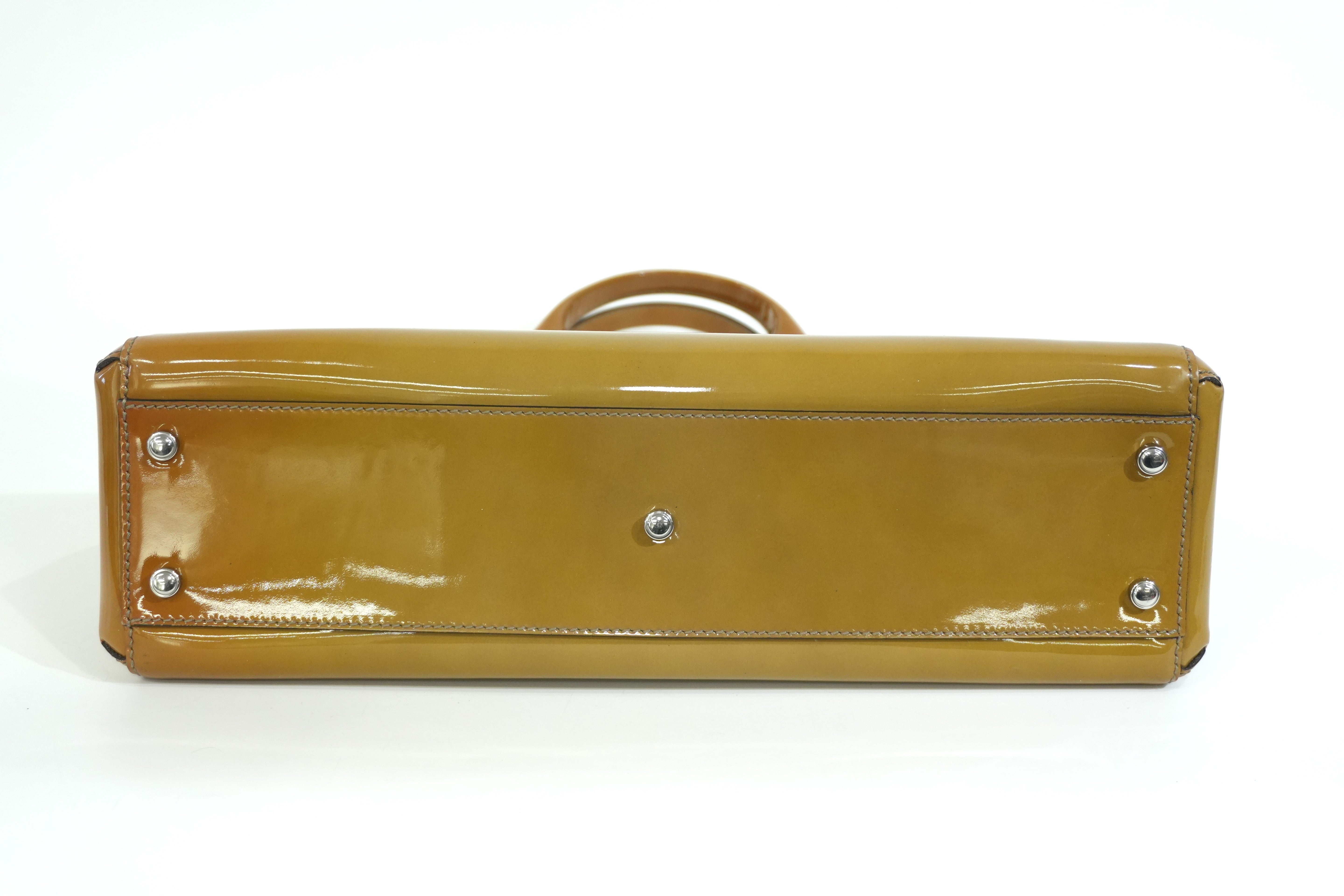 Pre-owned Cartier Leather Patent Handbag Tan