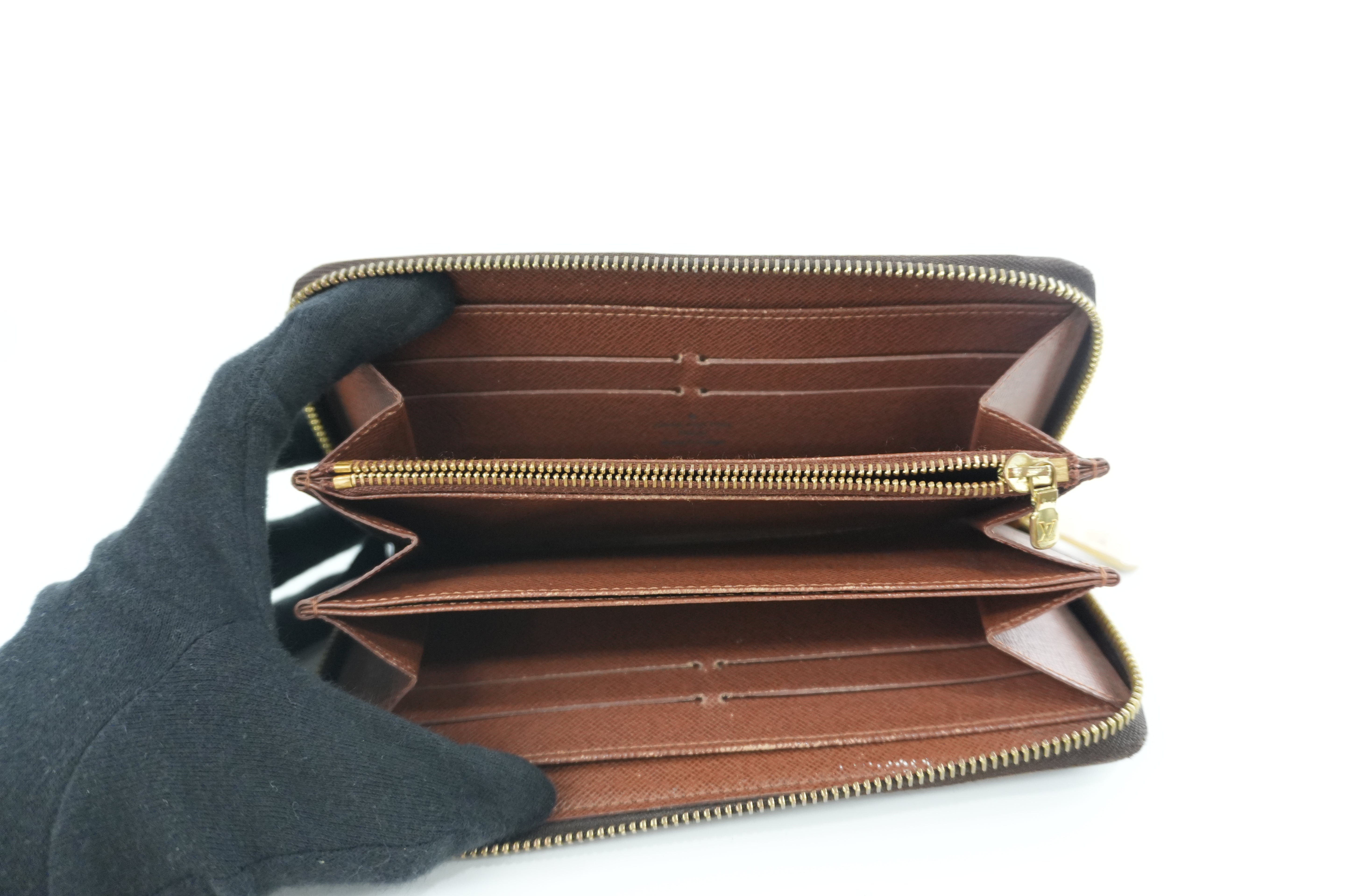 Pre-owned Louis Vuitton Monogram Zippy Wallet