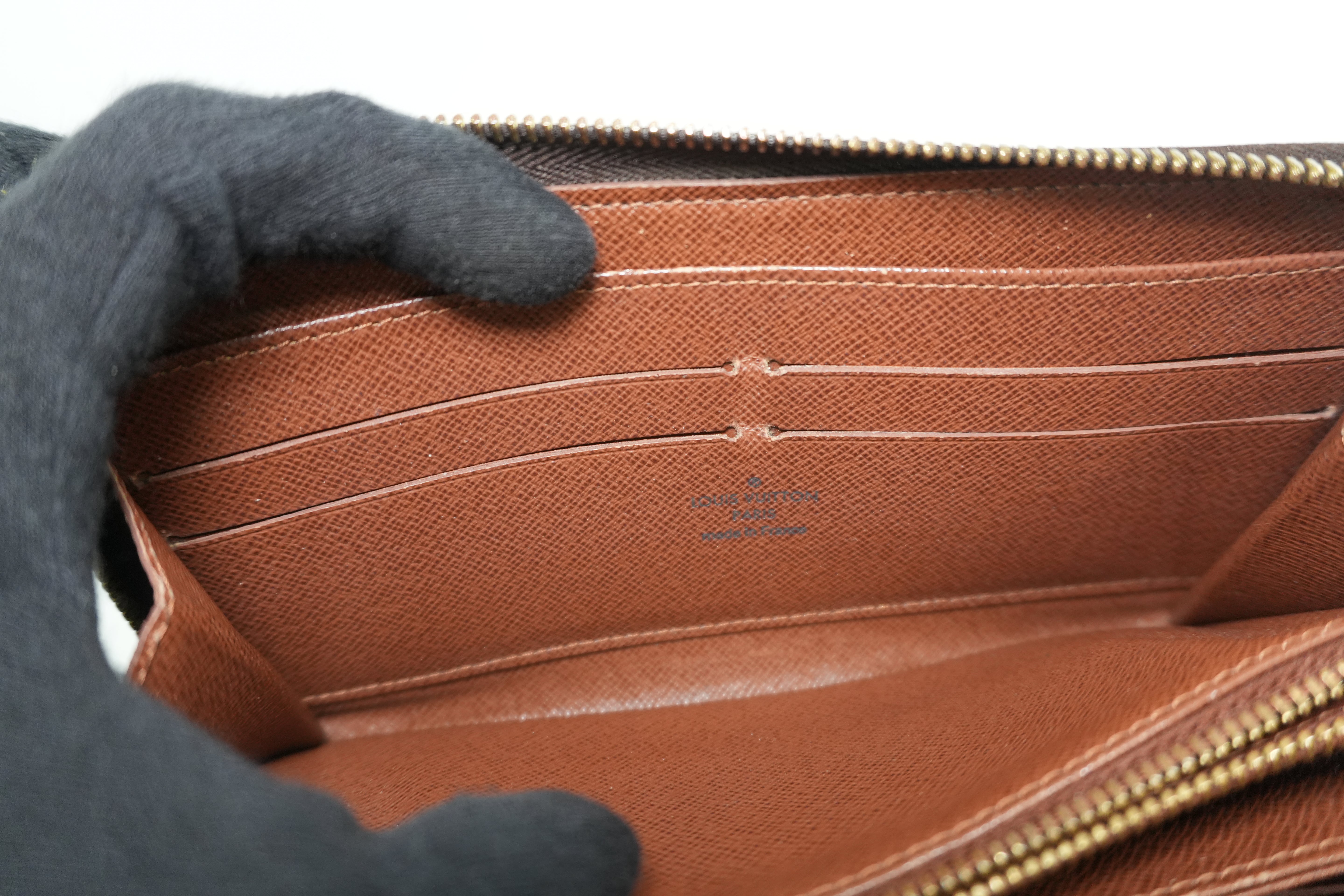 Pre-owned Louis Vuitton Monogram Zippy Wallet