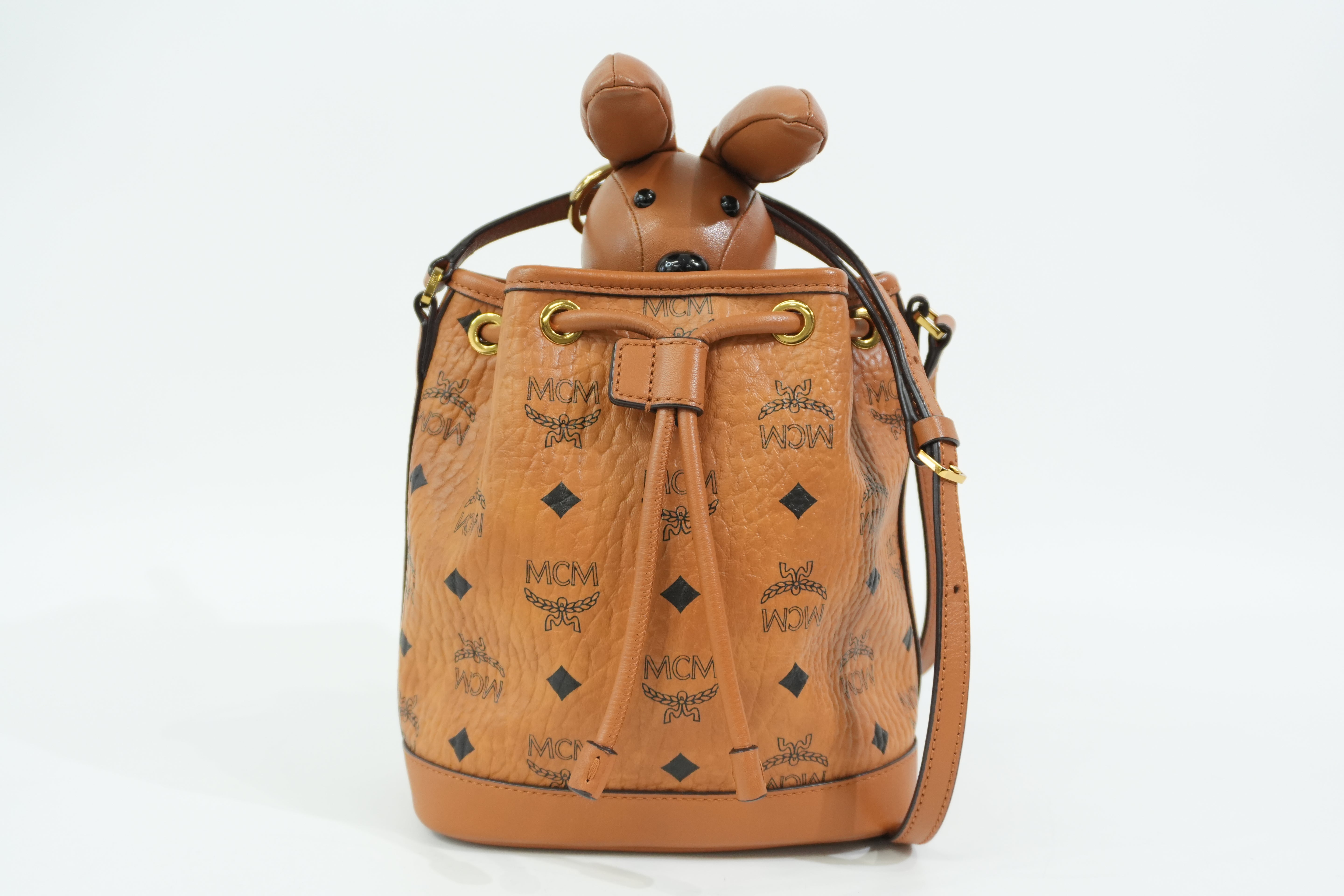 Pre-Owned MCM Park Rabbit Visetos Drawstring Crossbody bag Cognac
