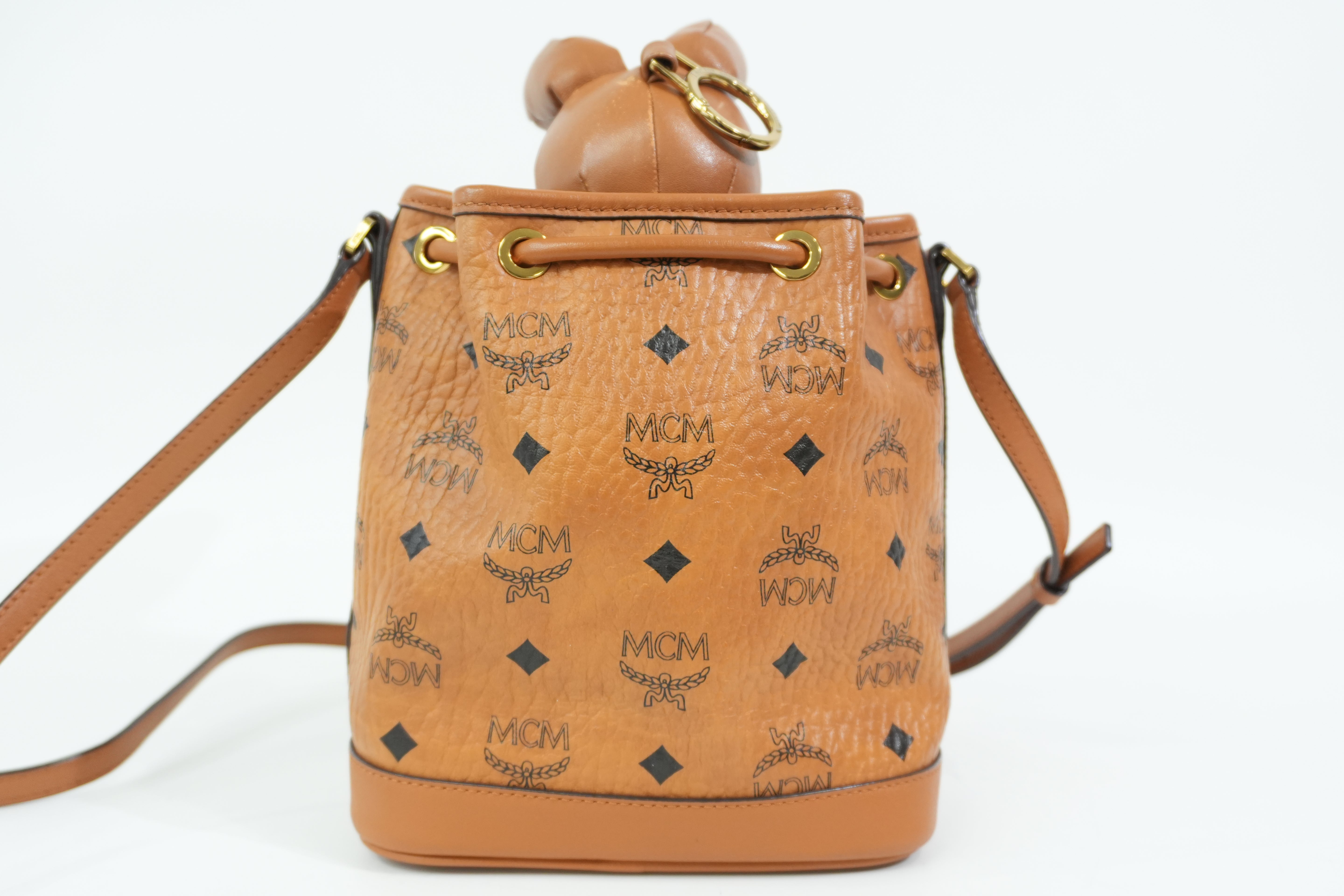 Pre-Owned MCM Park Rabbit Visetos Drawstring Crossbody bag Cognac