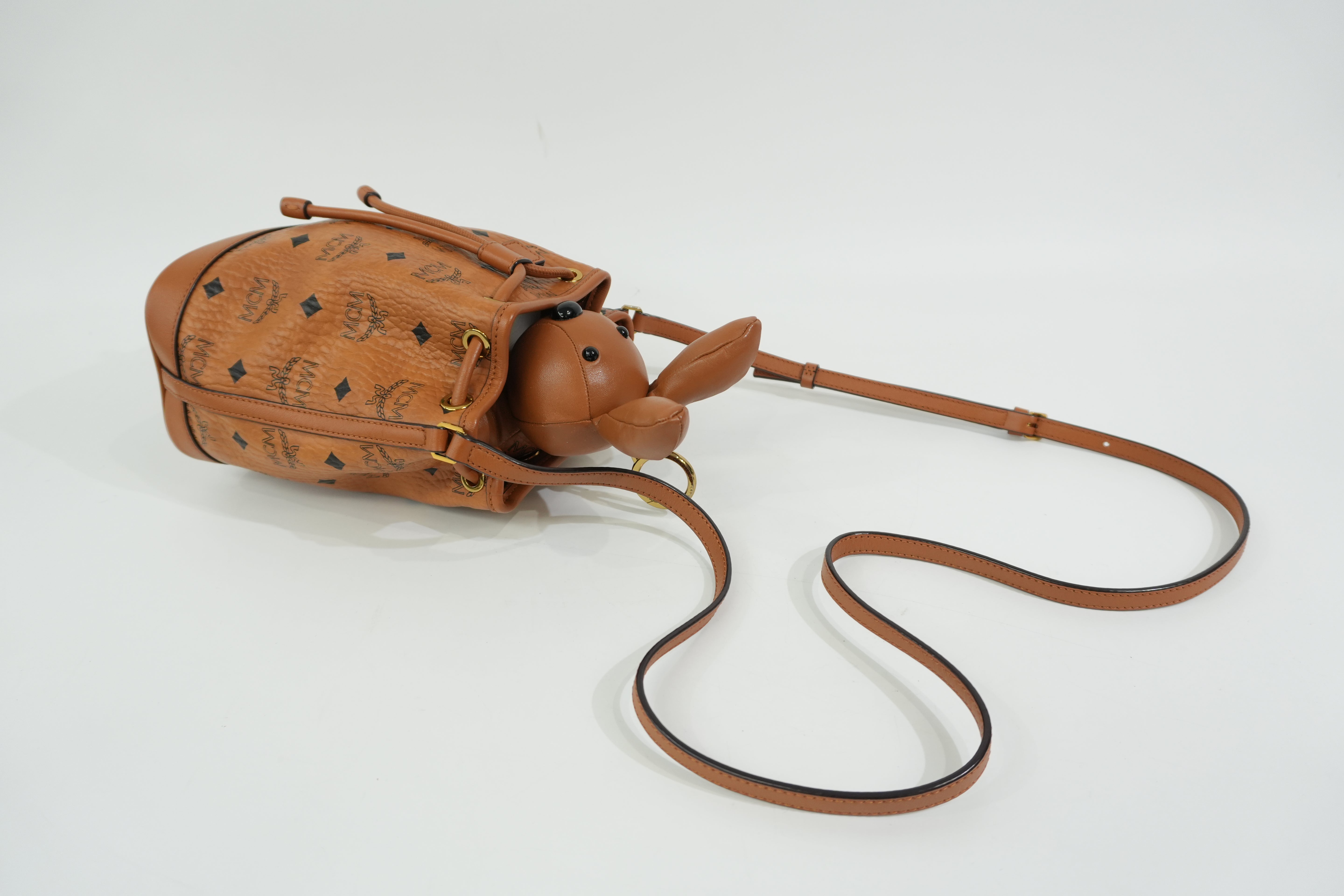Pre-Owned MCM Park Rabbit Visetos Drawstring Crossbody bag Cognac