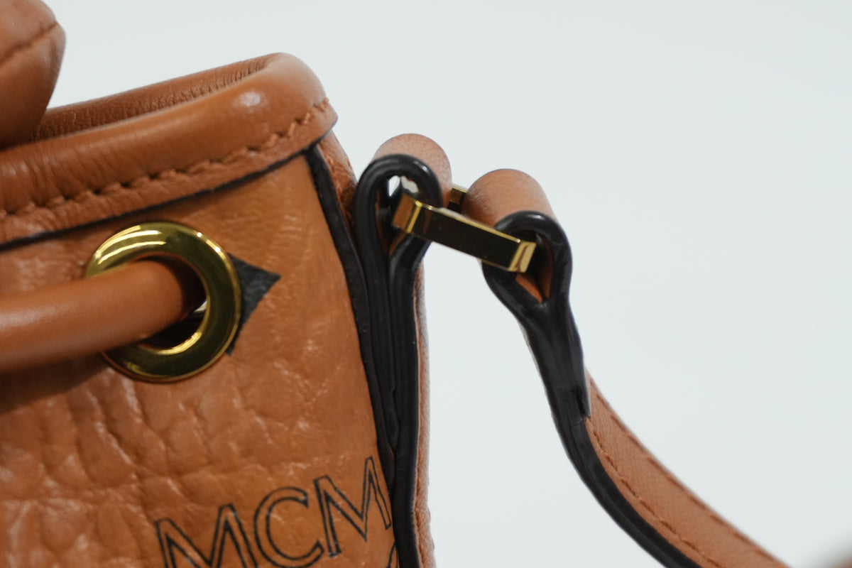 Pre-Owned MCM Park Rabbit Visetos Drawstring Crossbody bag Cognac