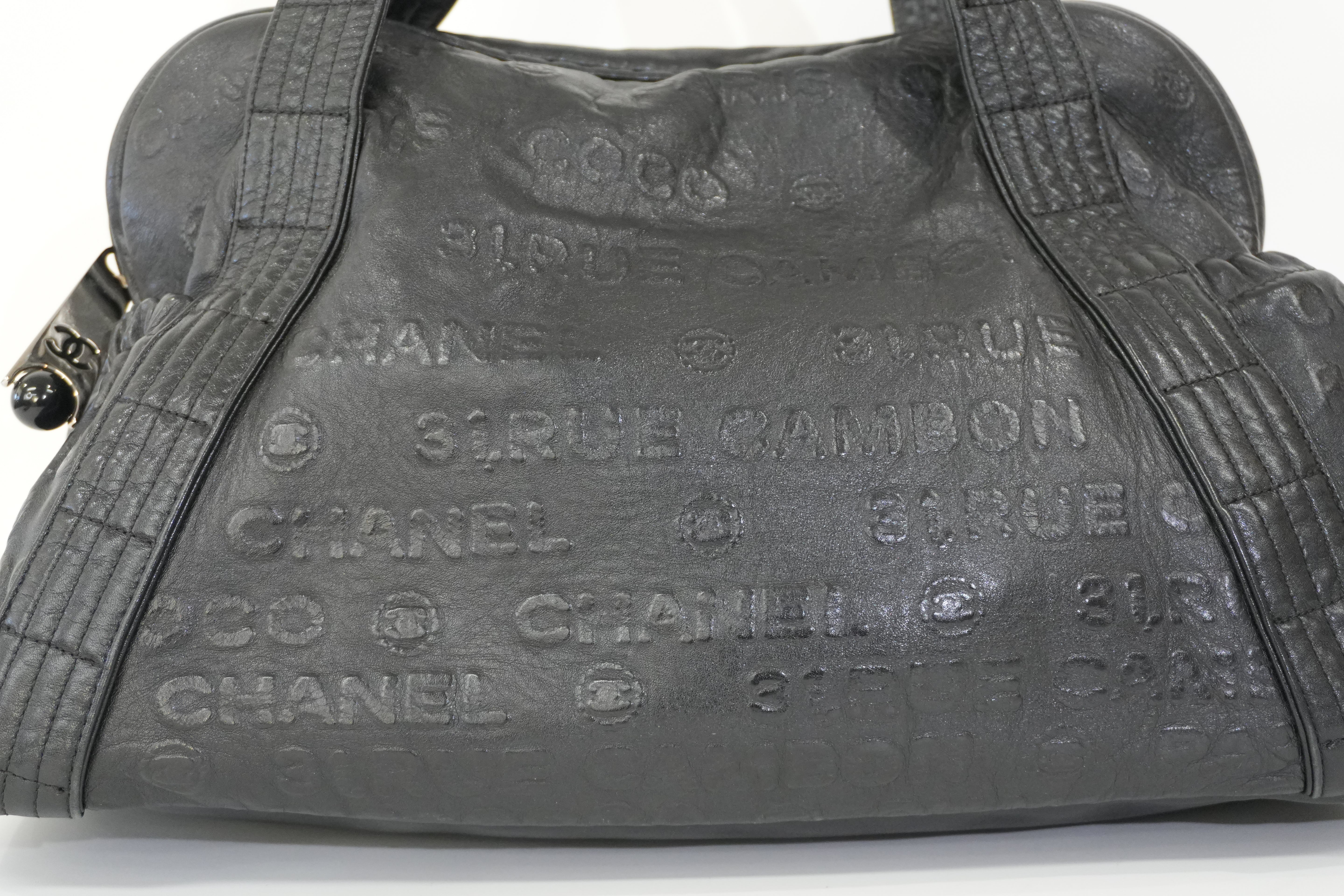 Pre-owned Chanel Lambskin Leather 31 Rue Cambon Embossed Tote Bag Black