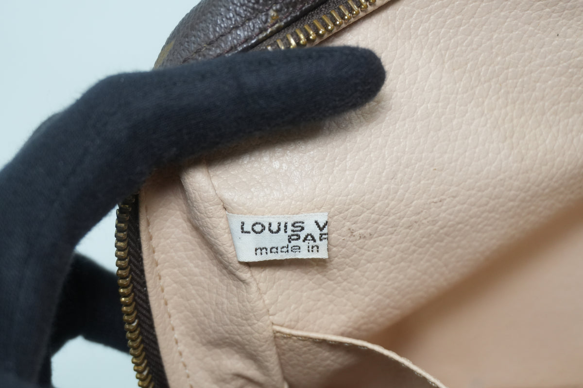 Pre-Owned Louis Vuitton Monogram Trousse 28