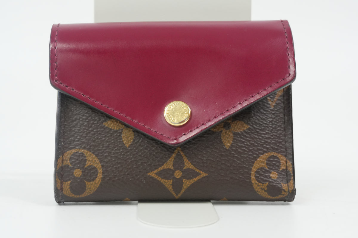 Pre-Owned Louis Vuitton Zoe Trifold Wallet