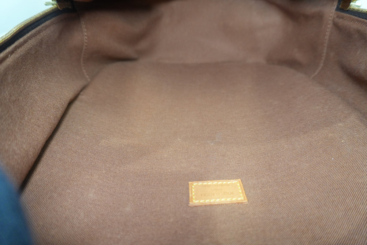 Pre-Owned Louis Vuitton Monogram Packall PM