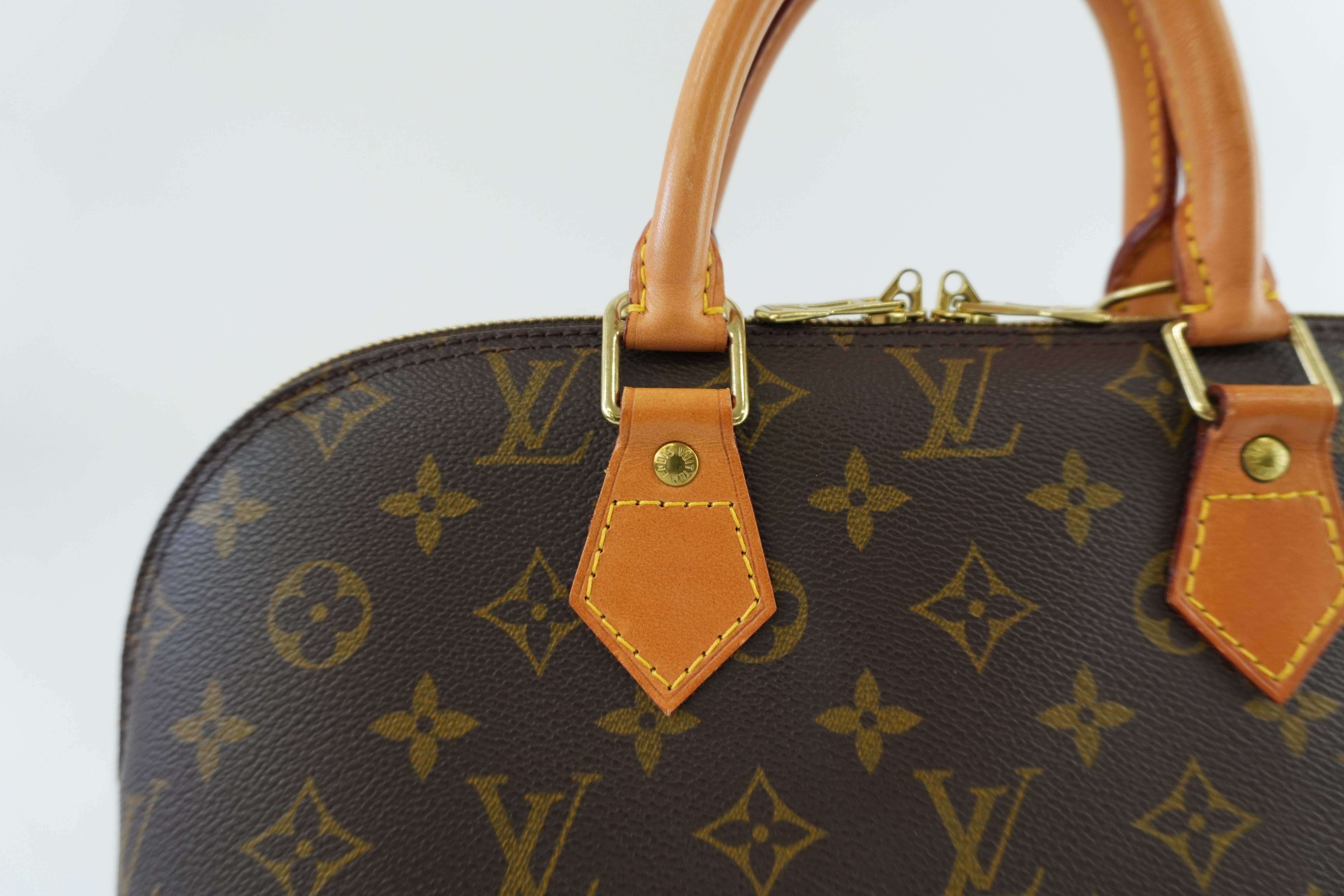 Louis Vuitton Monogram Alma Handbag Used