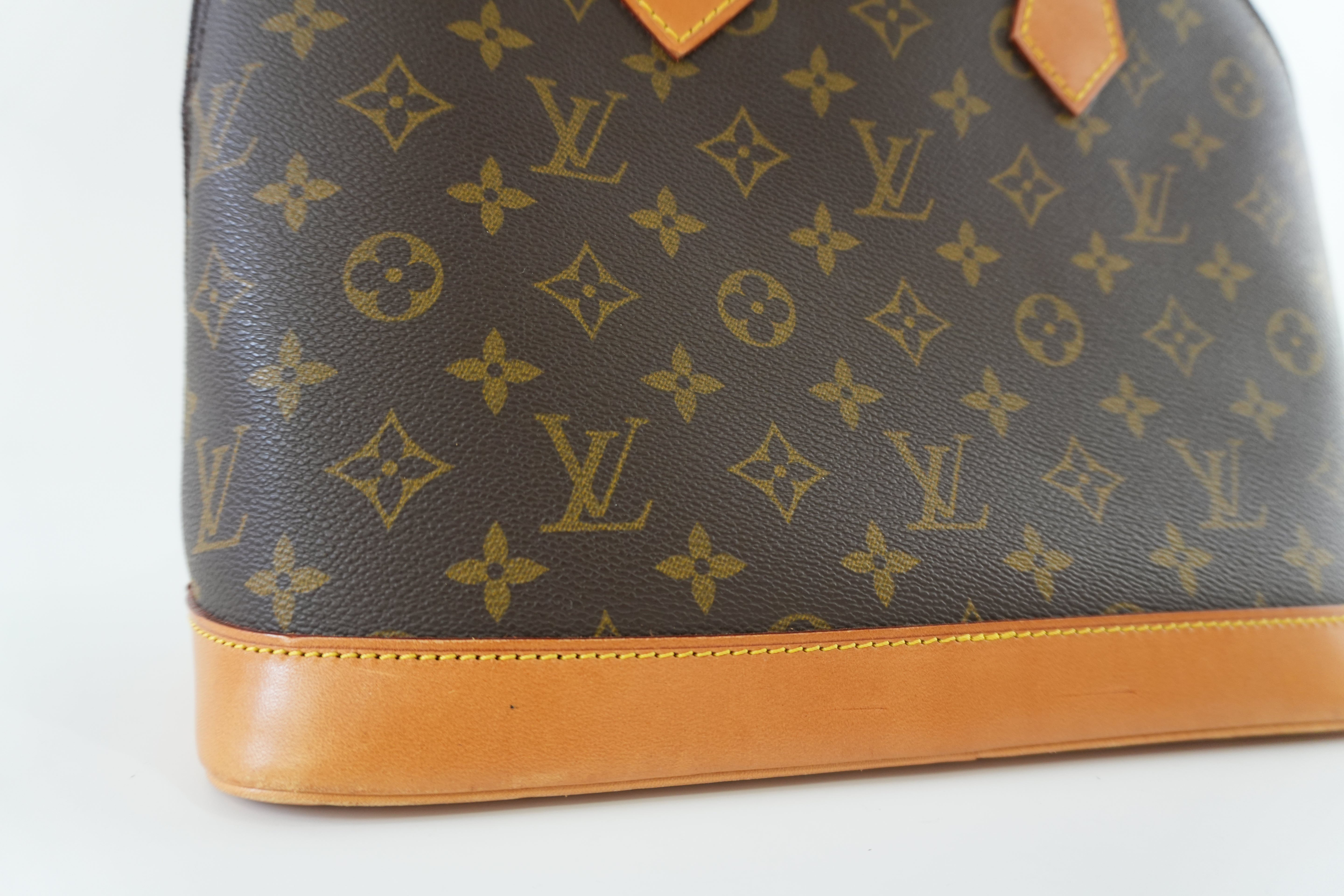 Louis Vuitton Monogram Alma Handbag Used