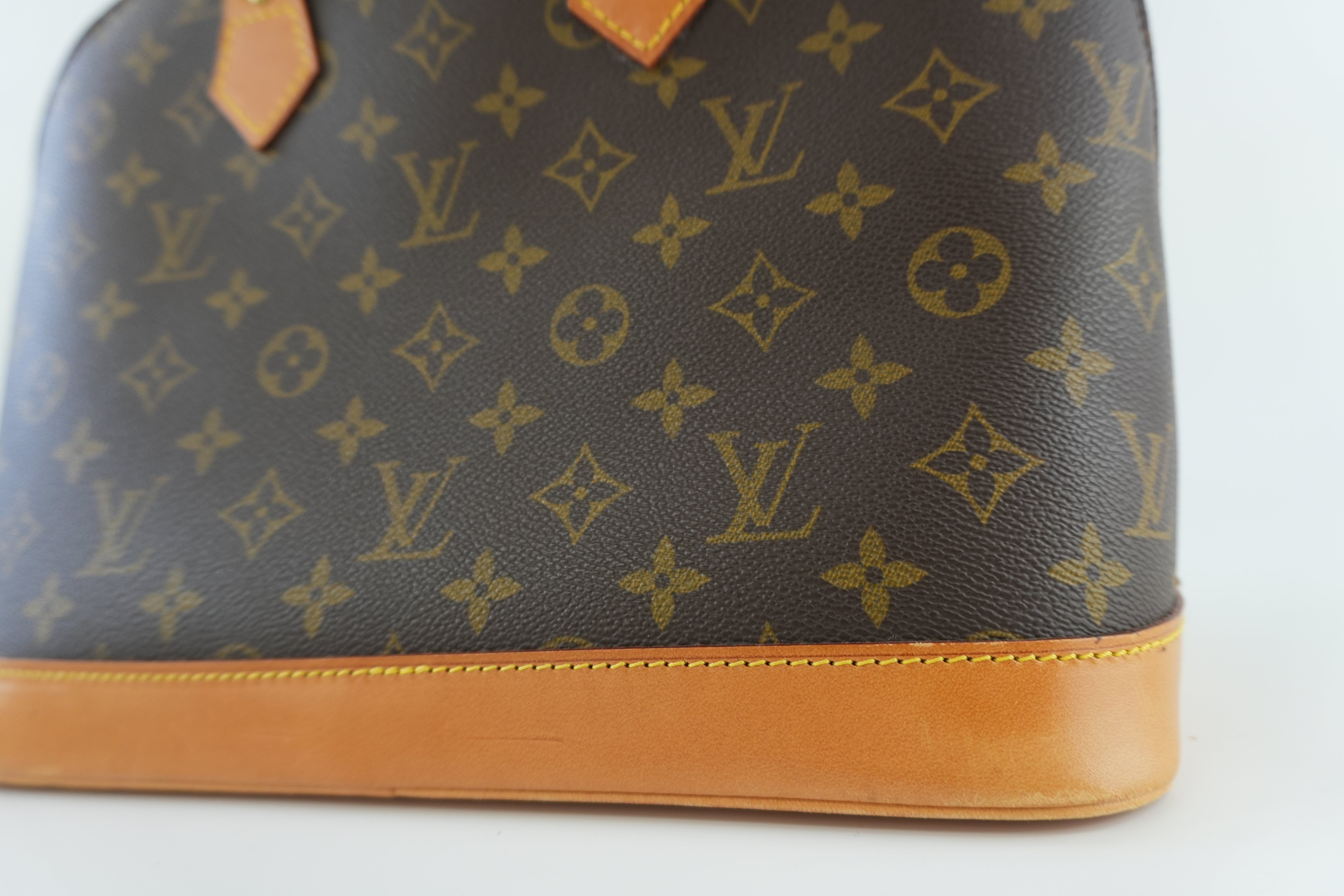Louis Vuitton Monogram Alma Handbag Used