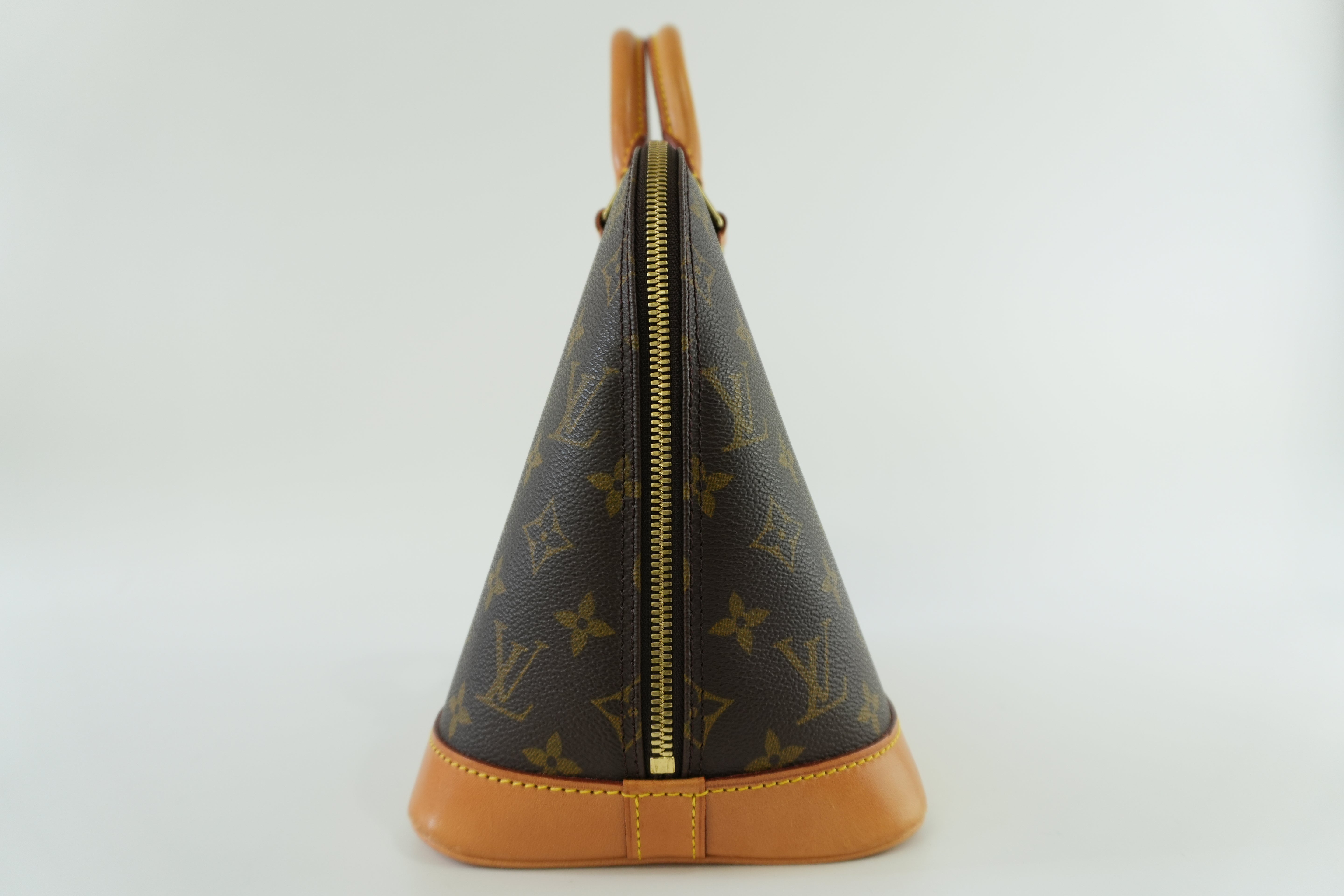 Louis Vuitton Monogram Alma Handbag Used