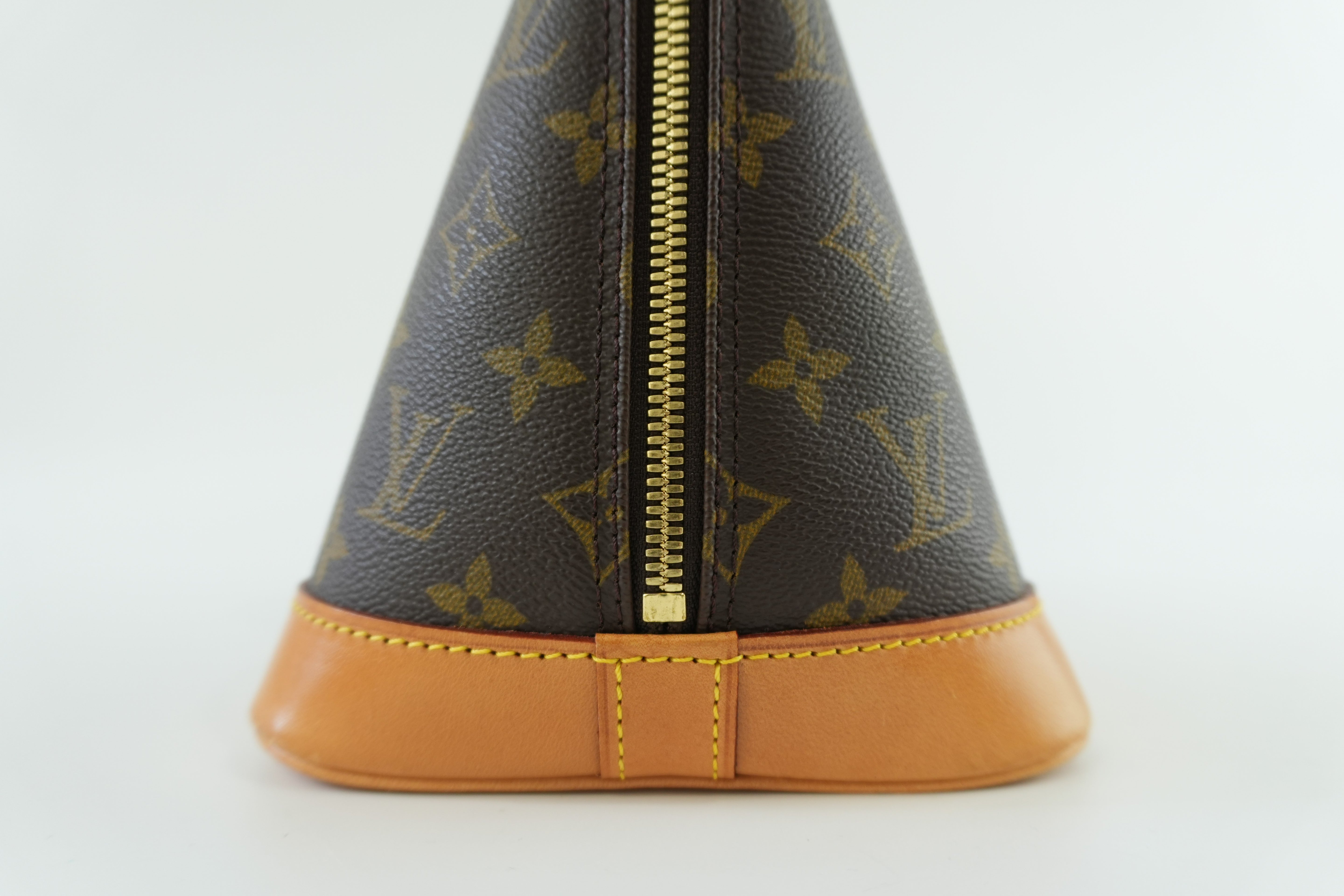 Louis Vuitton Monogram Alma Handbag Used