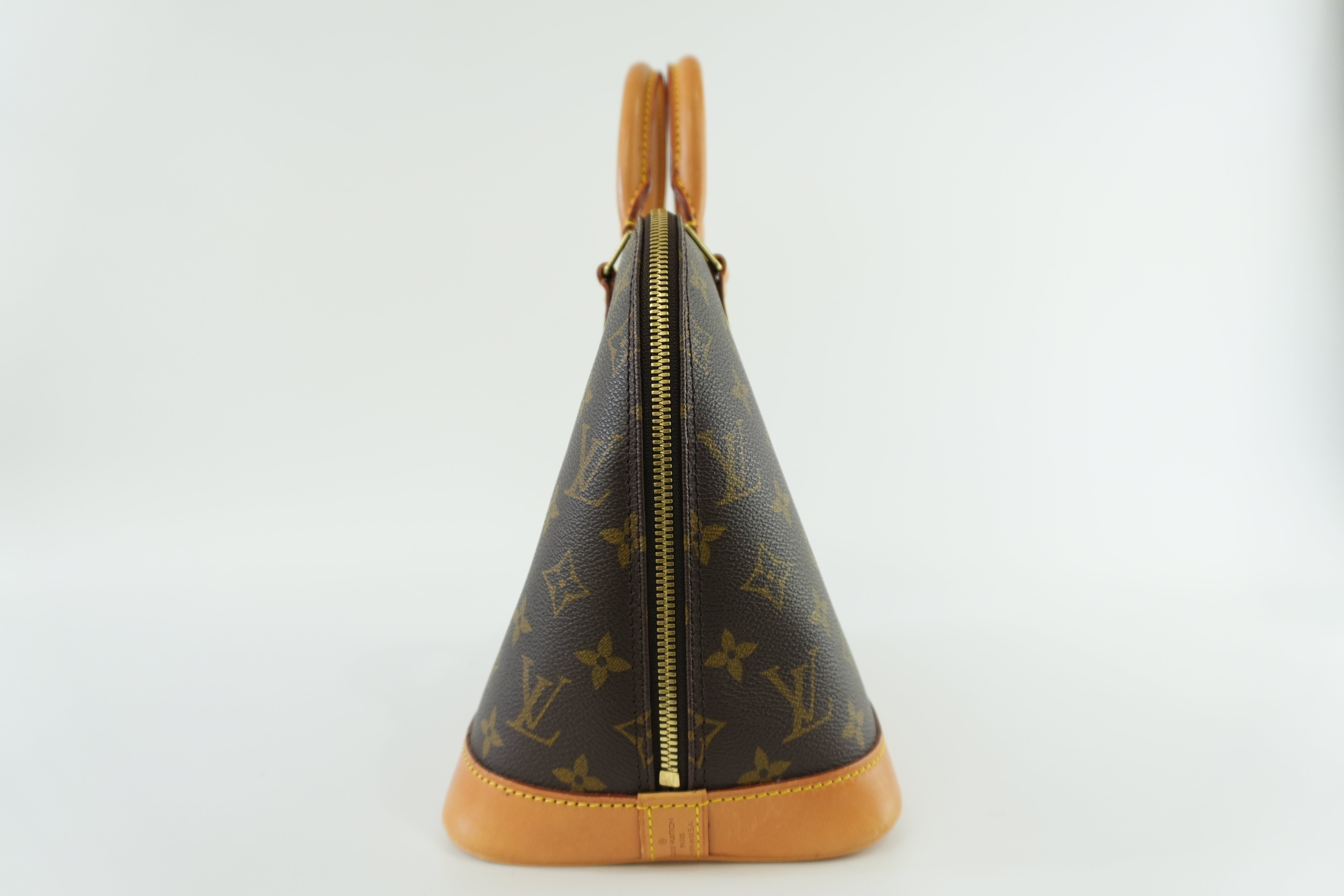 Louis Vuitton Monogram Alma Handbag Used