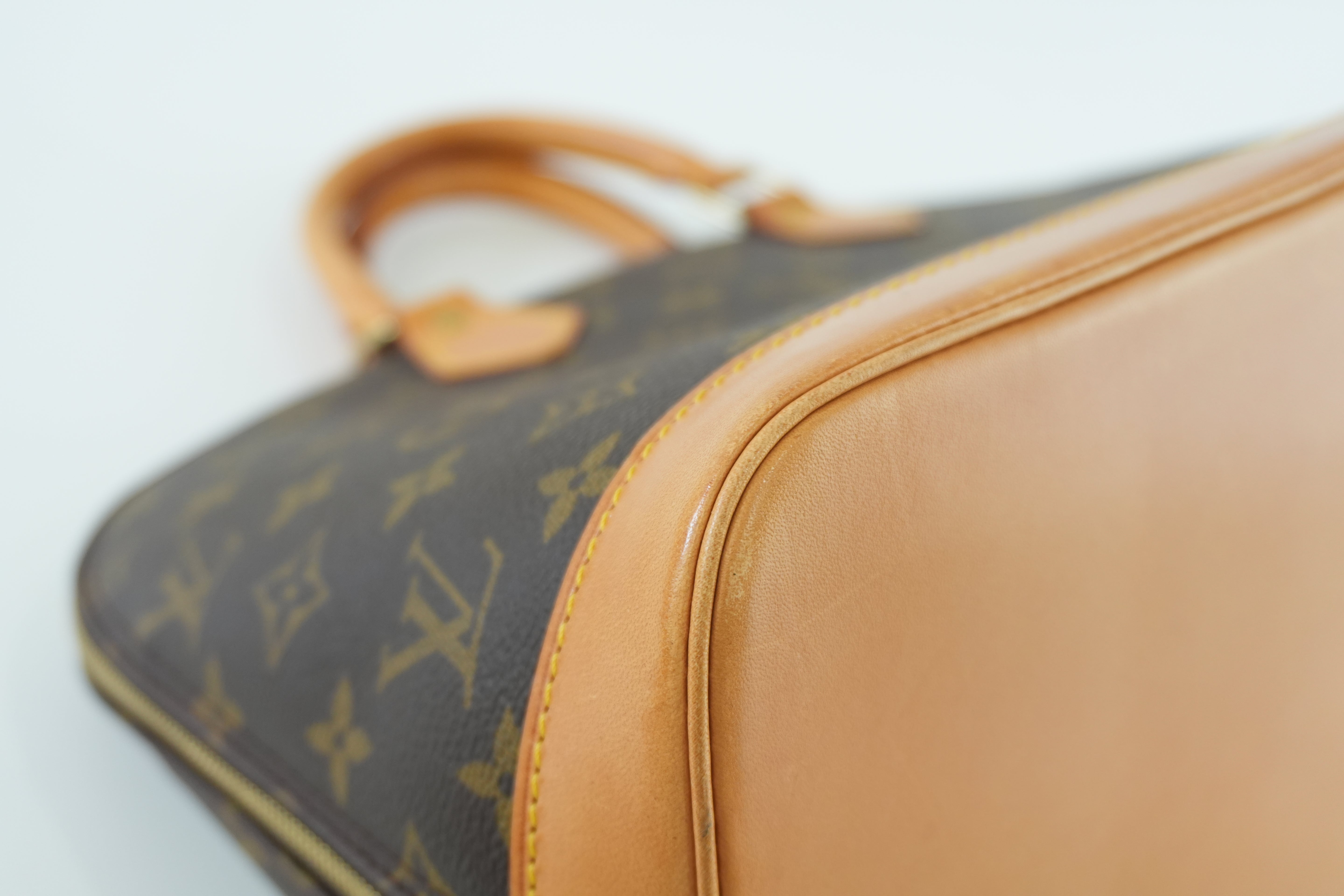 Louis Vuitton Monogram Alma Handbag Used