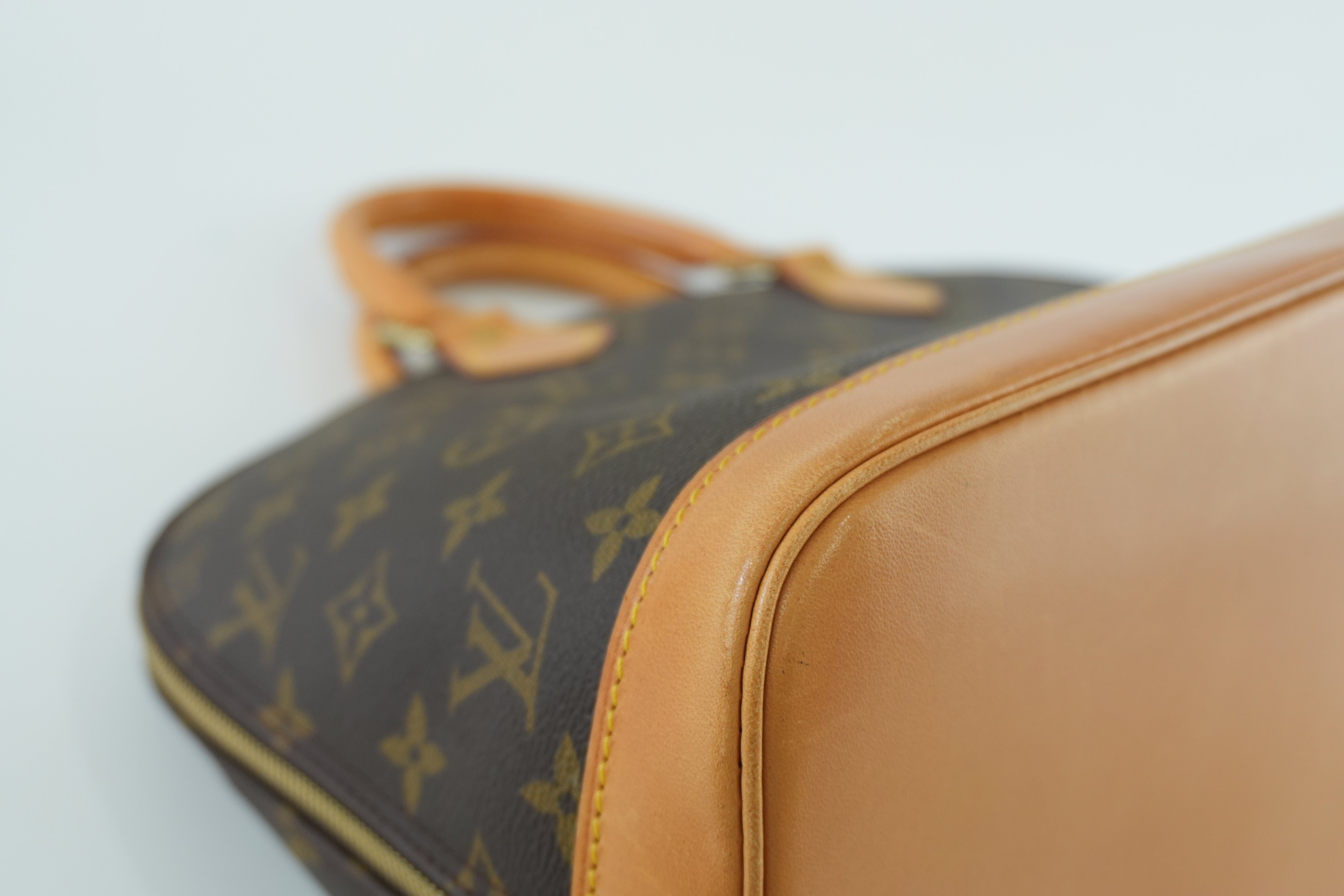 Louis Vuitton Monogram Alma Handbag Used