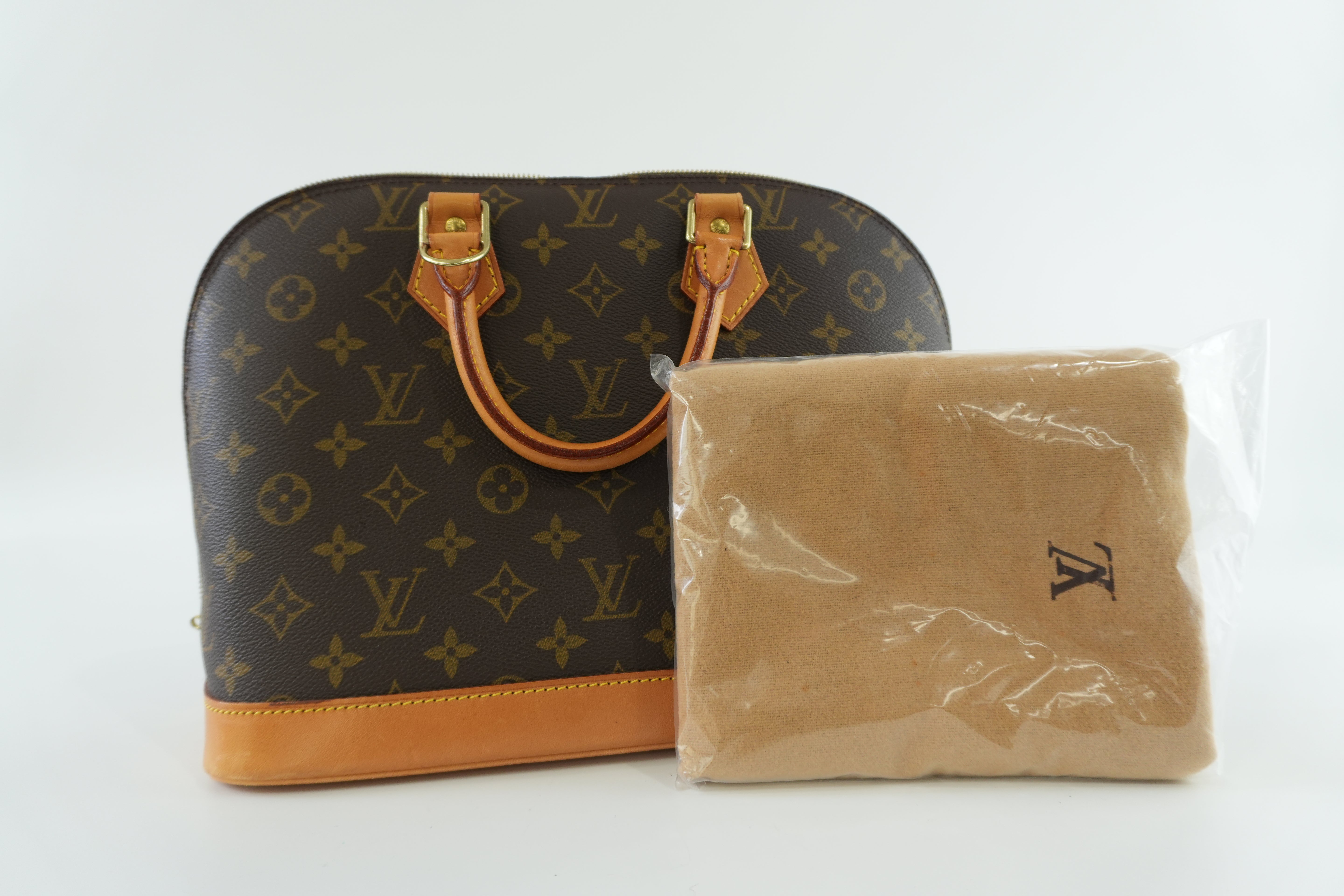 Louis Vuitton Monogram Alma Handbag Used