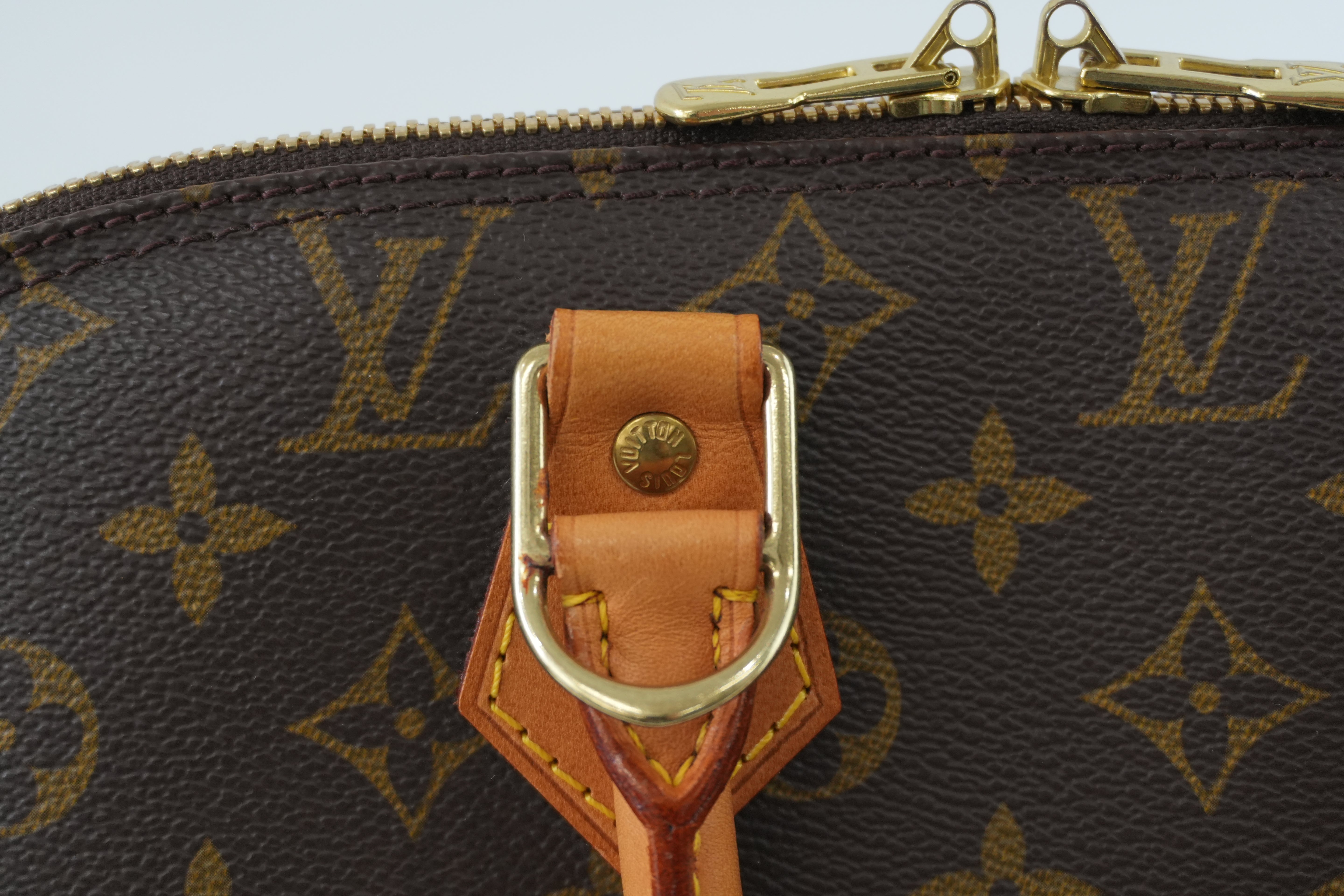 Louis Vuitton Monogram Alma Handbag Used
