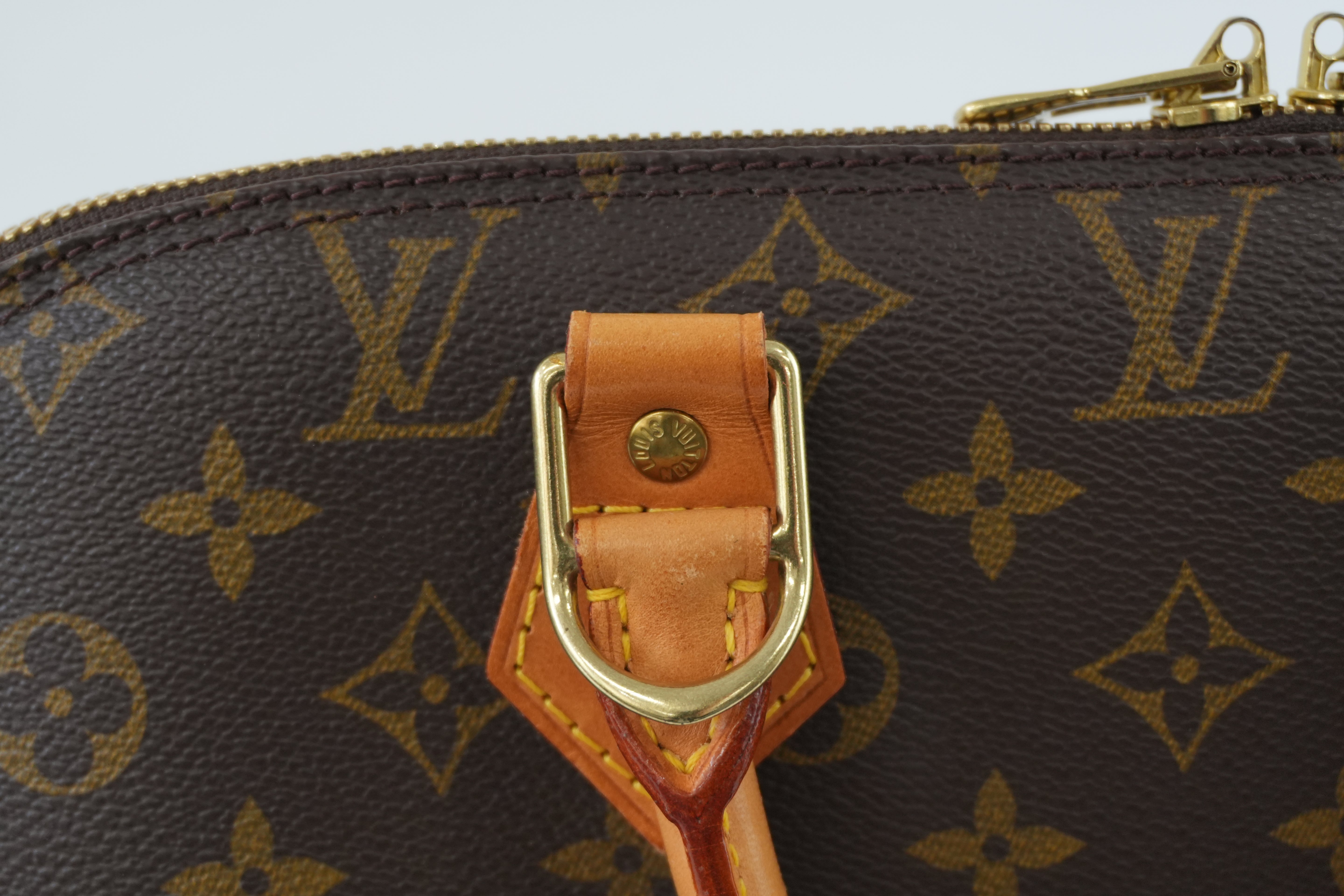 Louis Vuitton Monogram Alma Handbag Used