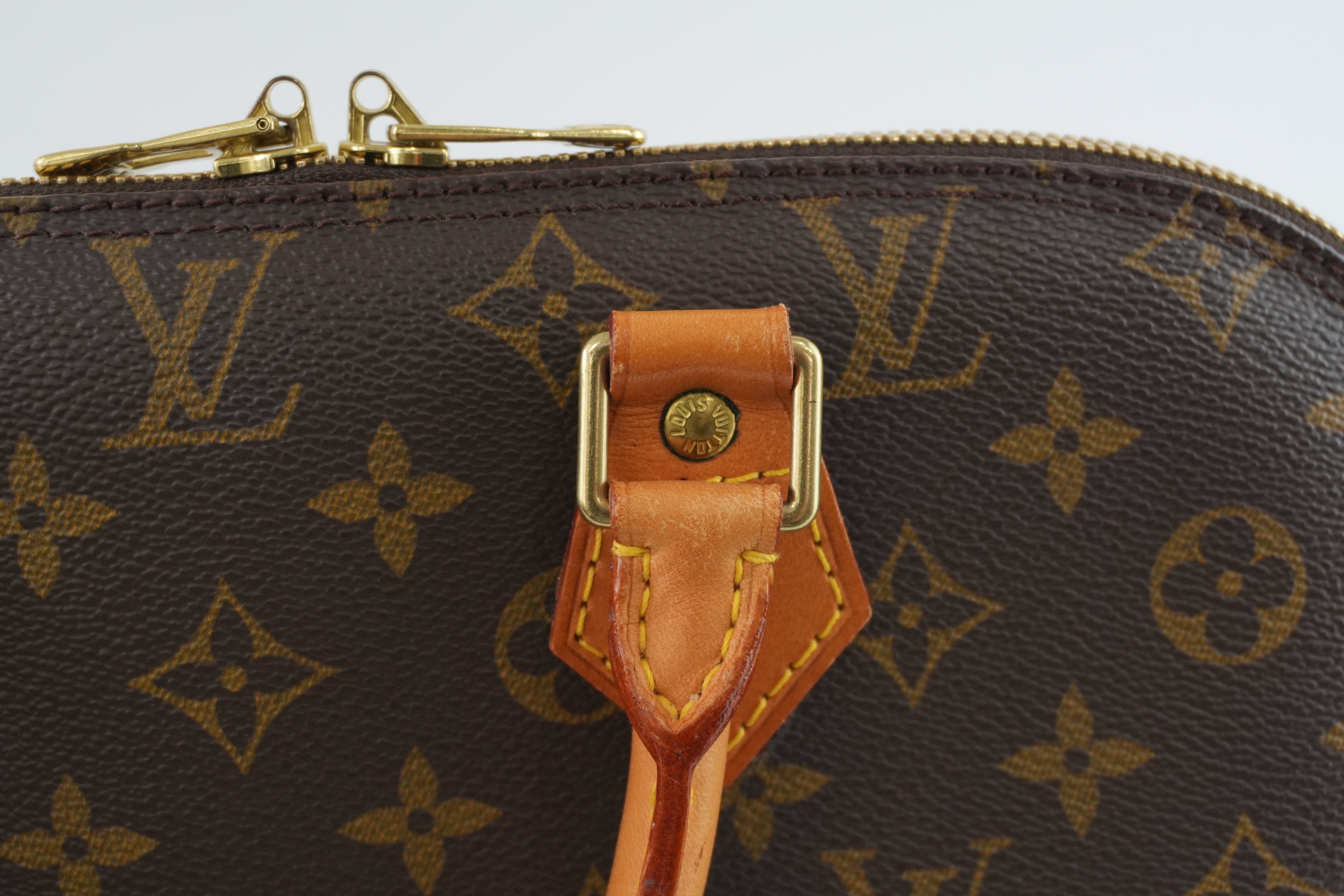 Louis Vuitton Monogram Alma Handbag Used