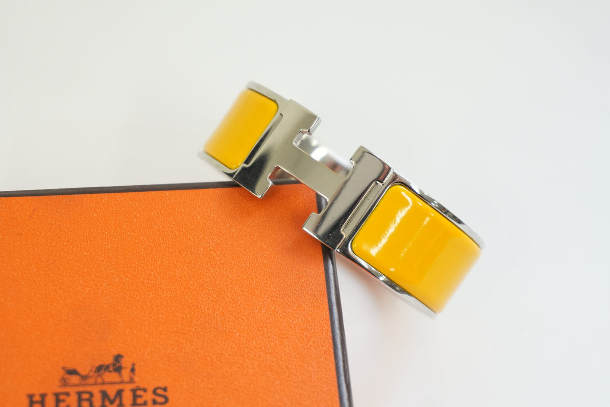 Pre-Owned Hermes Clic Clac Bracelet Yellow