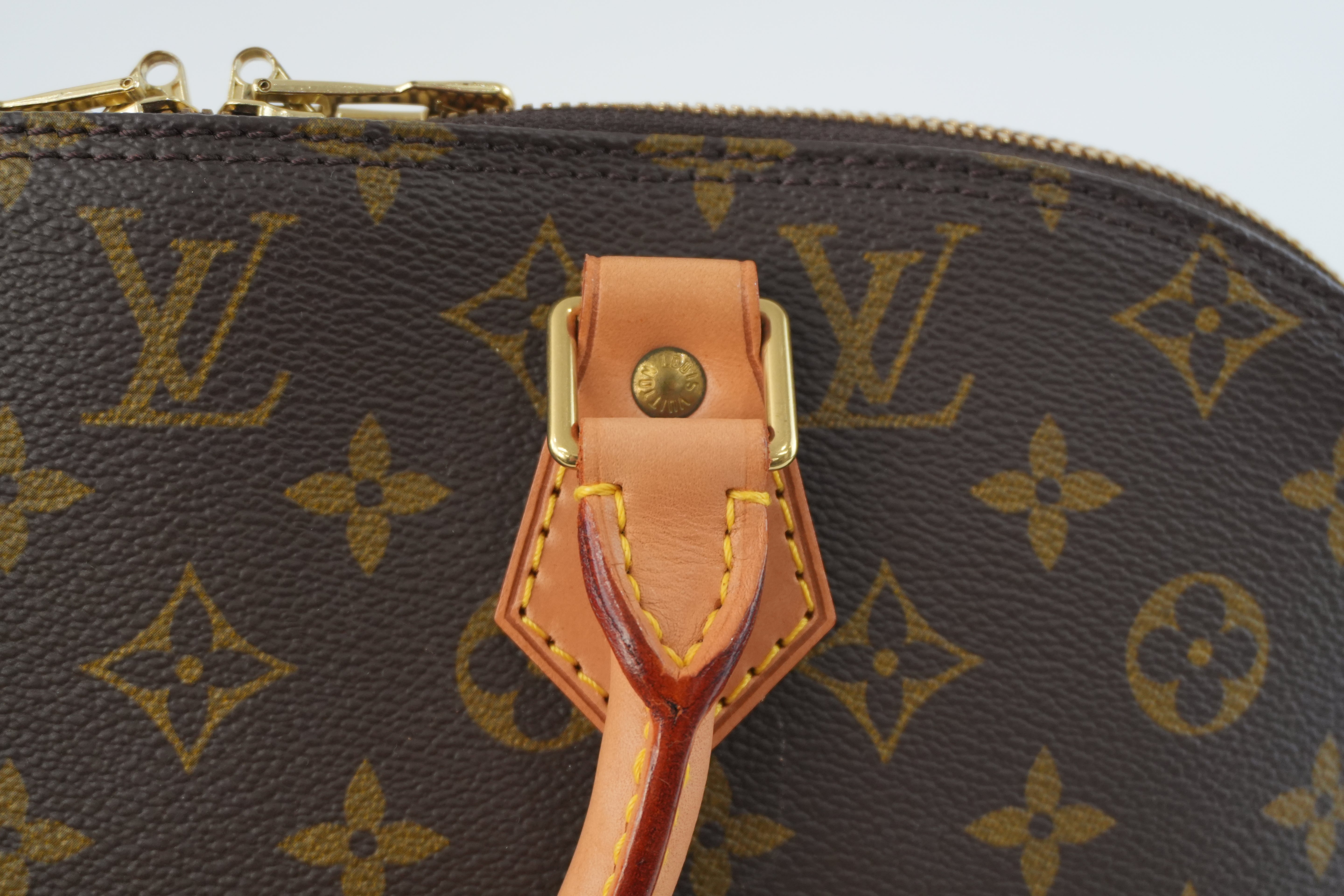 Louis Vuitton Monogram Alma Handbag Used