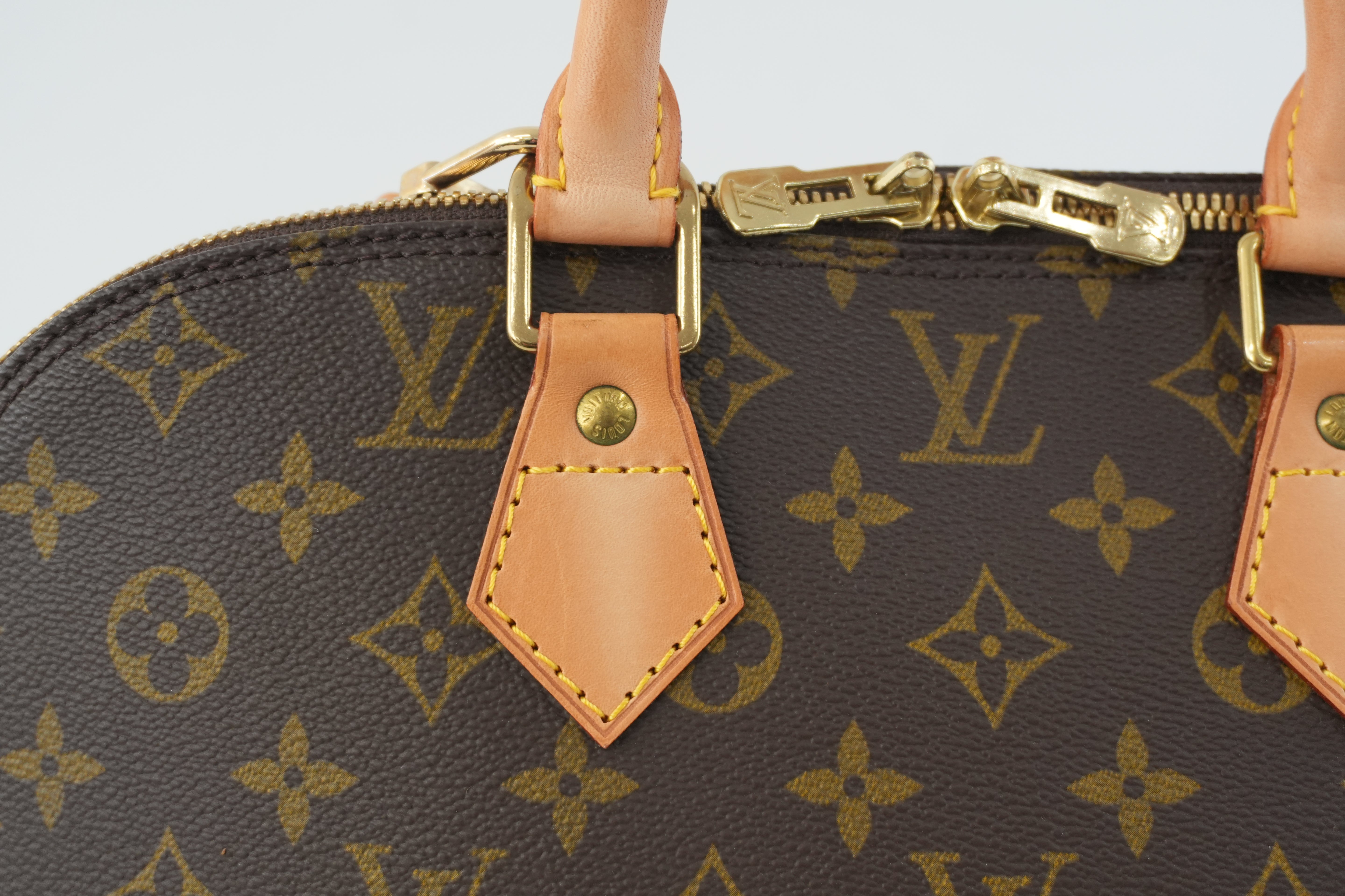 Louis Vuitton Monogram Alma Handbag Used