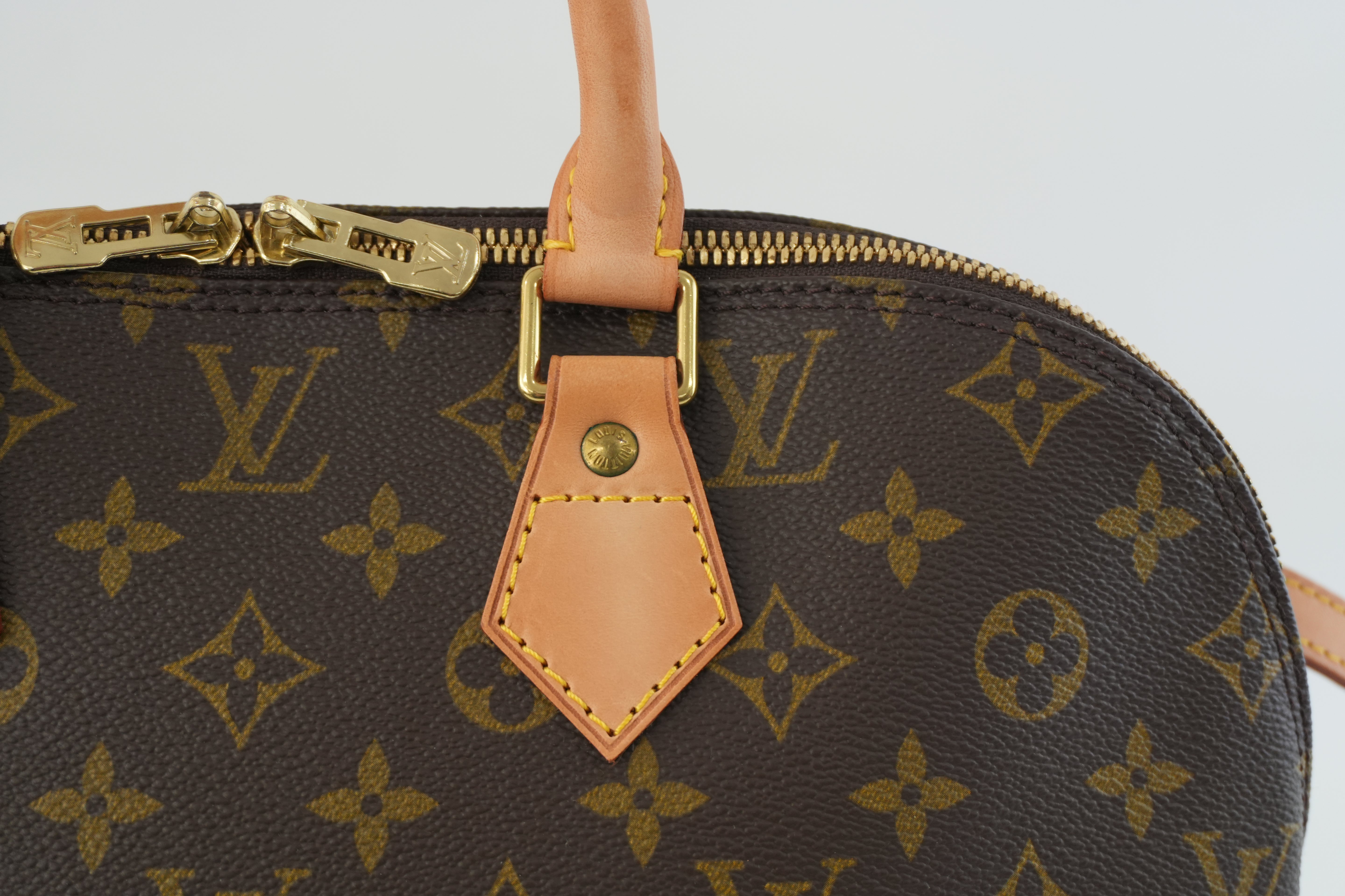Louis Vuitton Monogram Alma Handbag Used