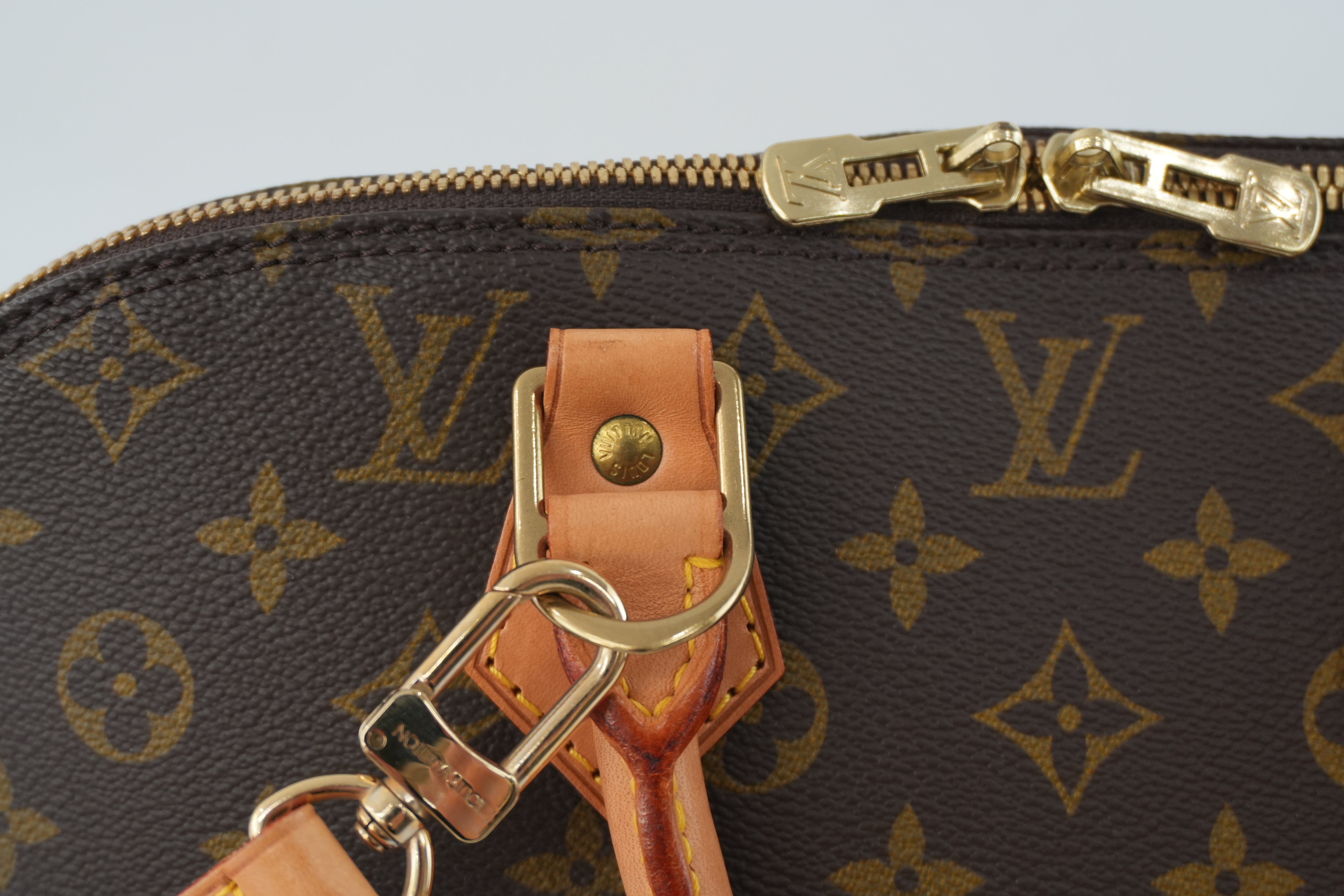 Louis Vuitton Monogram Alma Handbag Used