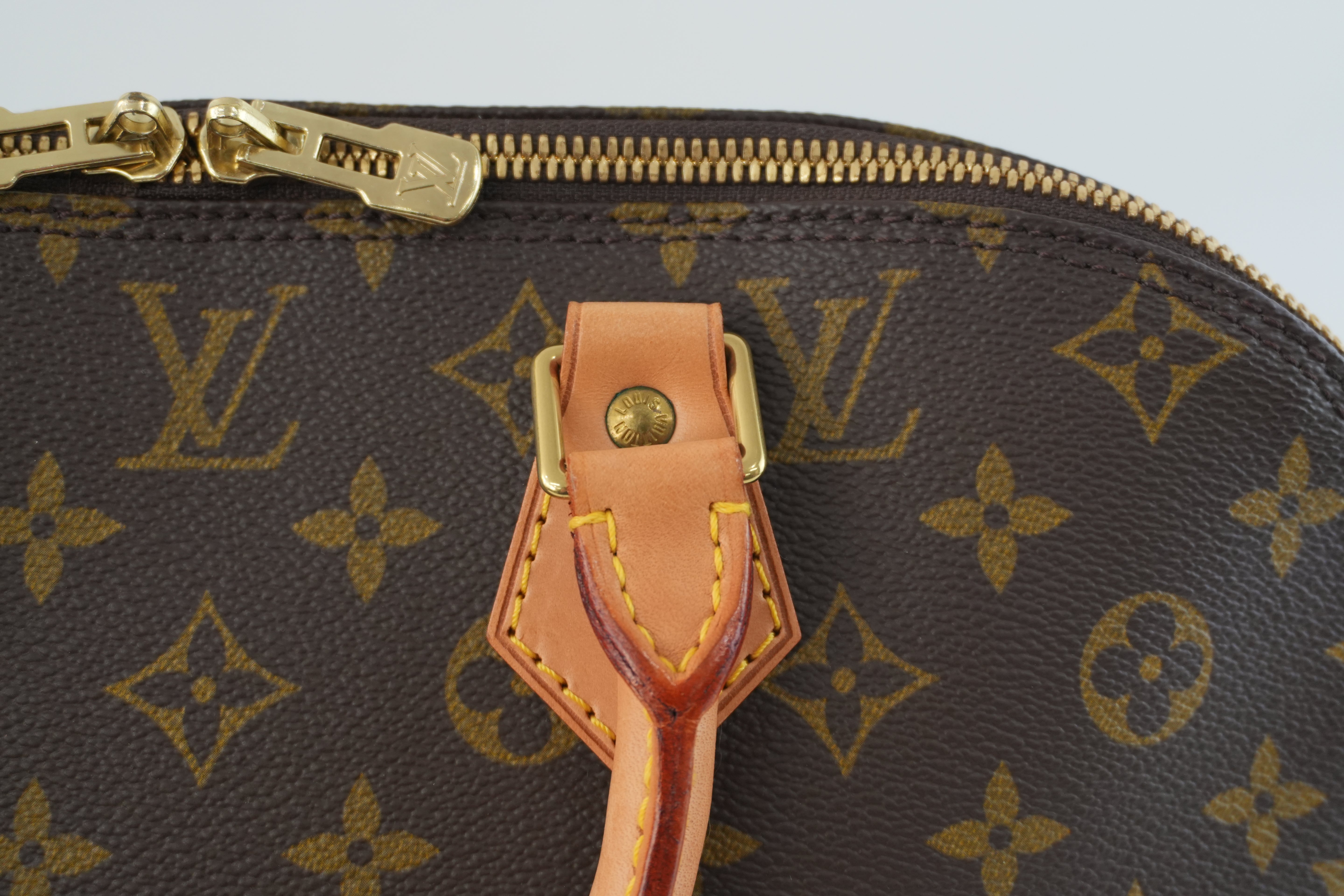 Louis Vuitton Monogram Alma Handbag Used