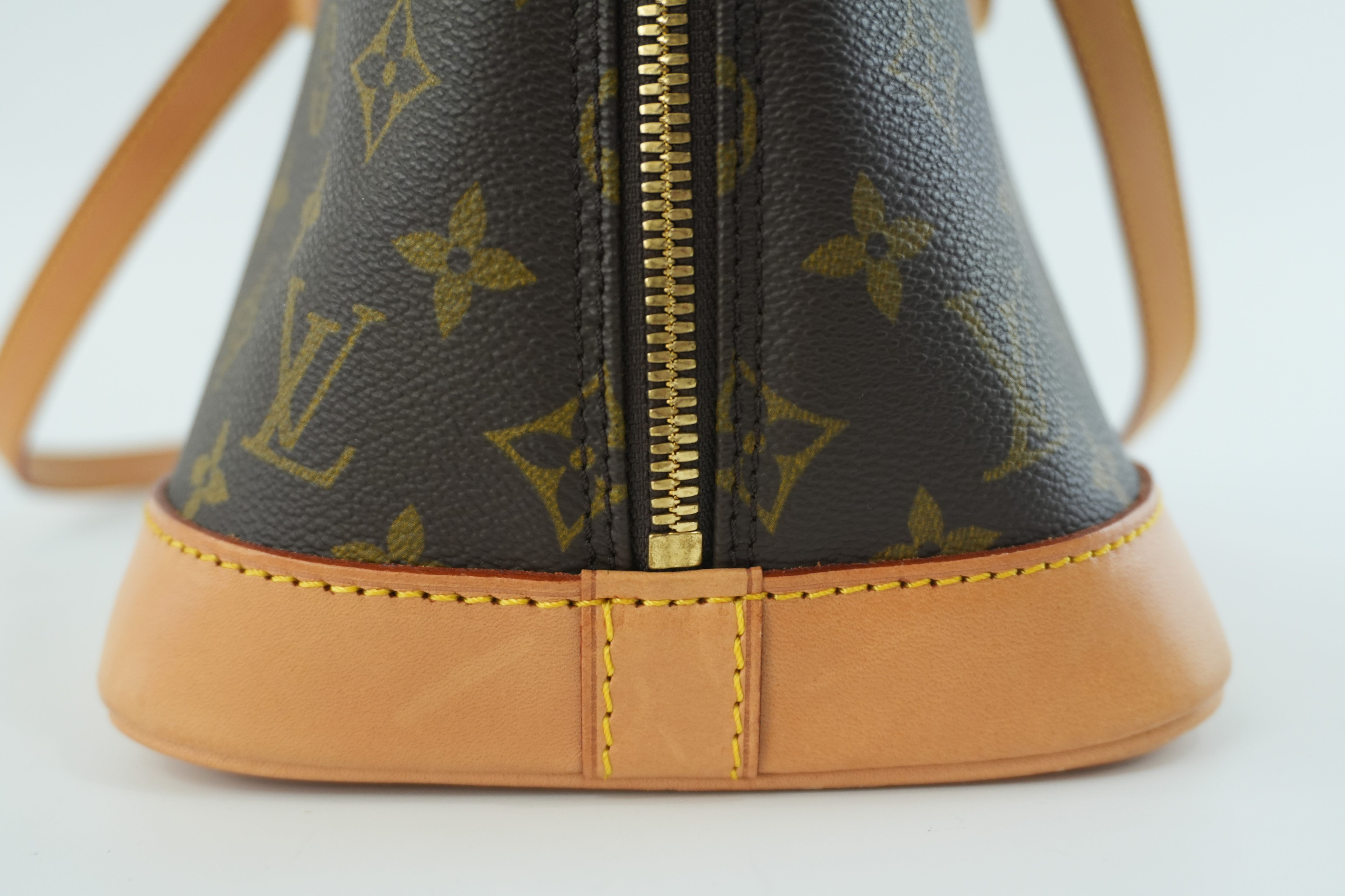 Louis Vuitton Monogram Alma Handbag Used