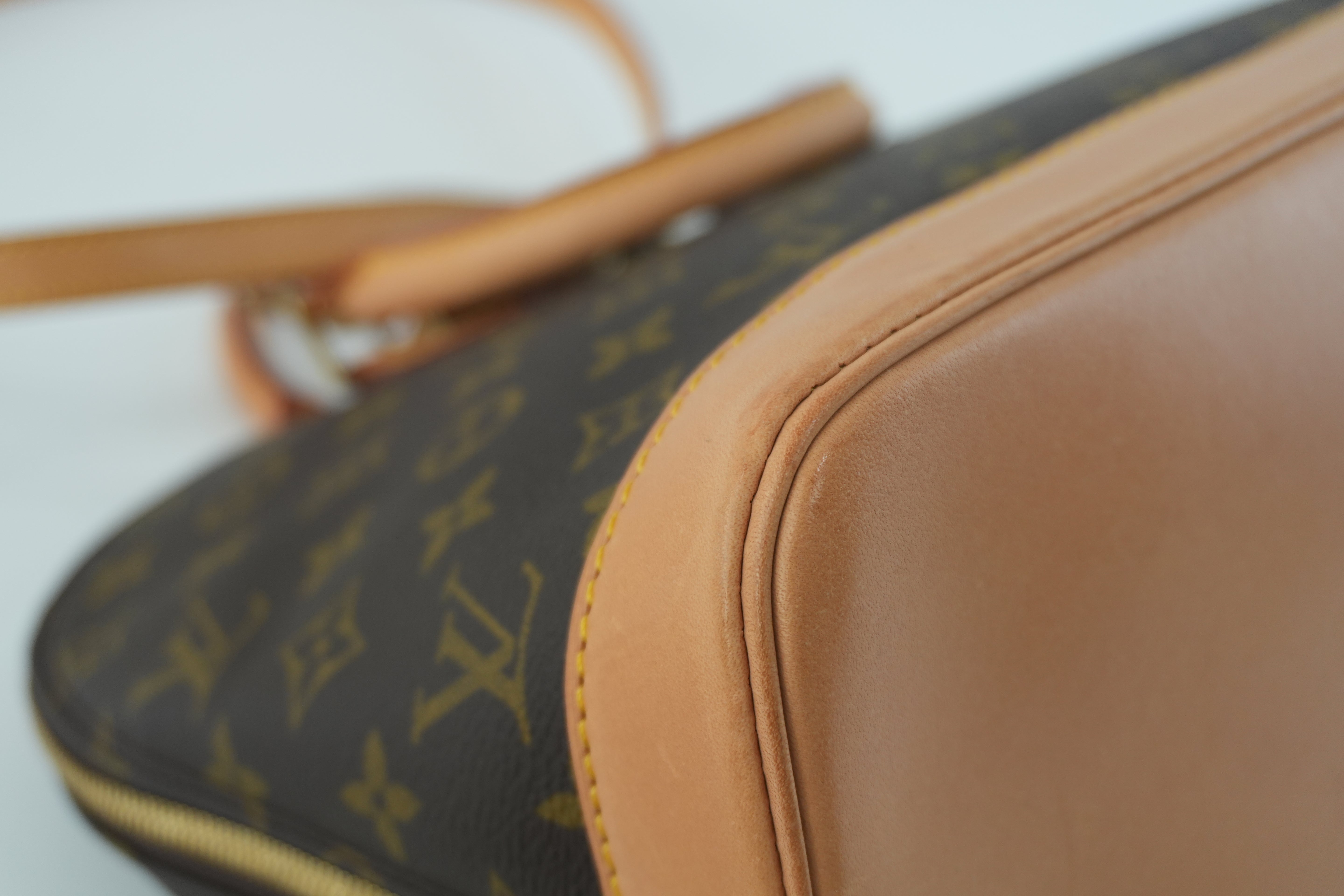 Louis Vuitton Monogram Alma Handbag Used