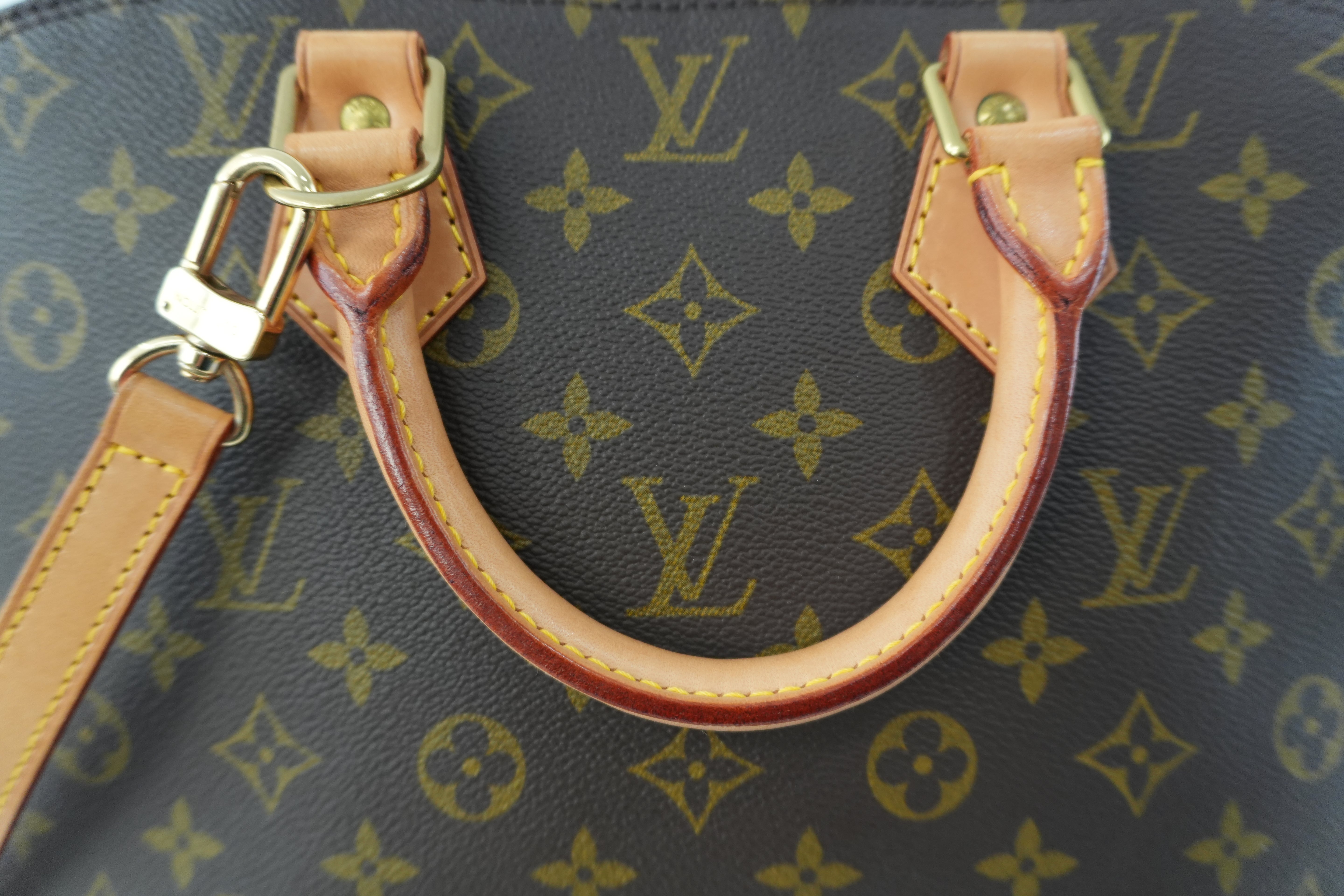 Louis Vuitton Monogram Alma Handbag Used