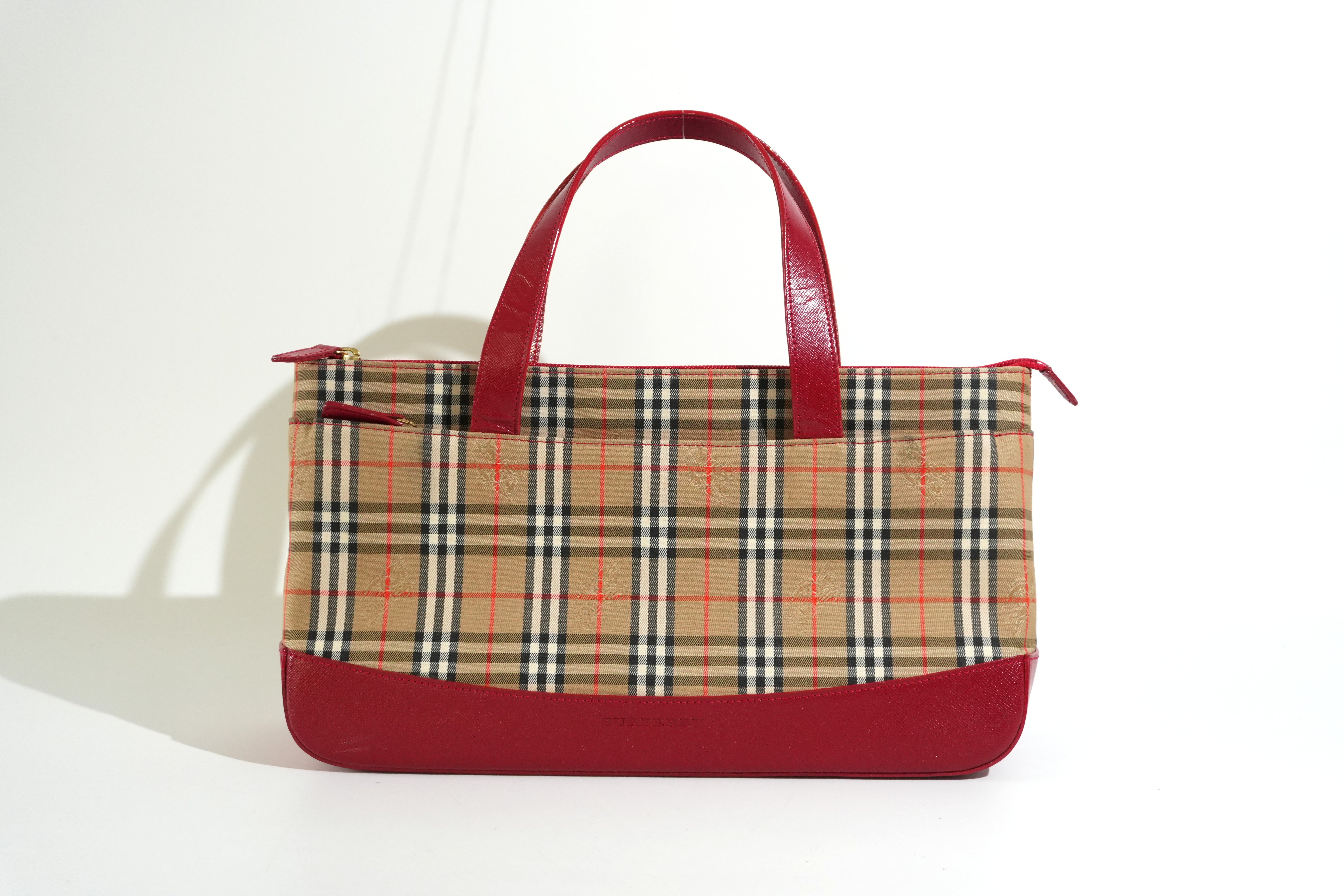 Pre-owned Burberry Haymarket Handbag Red and Brown