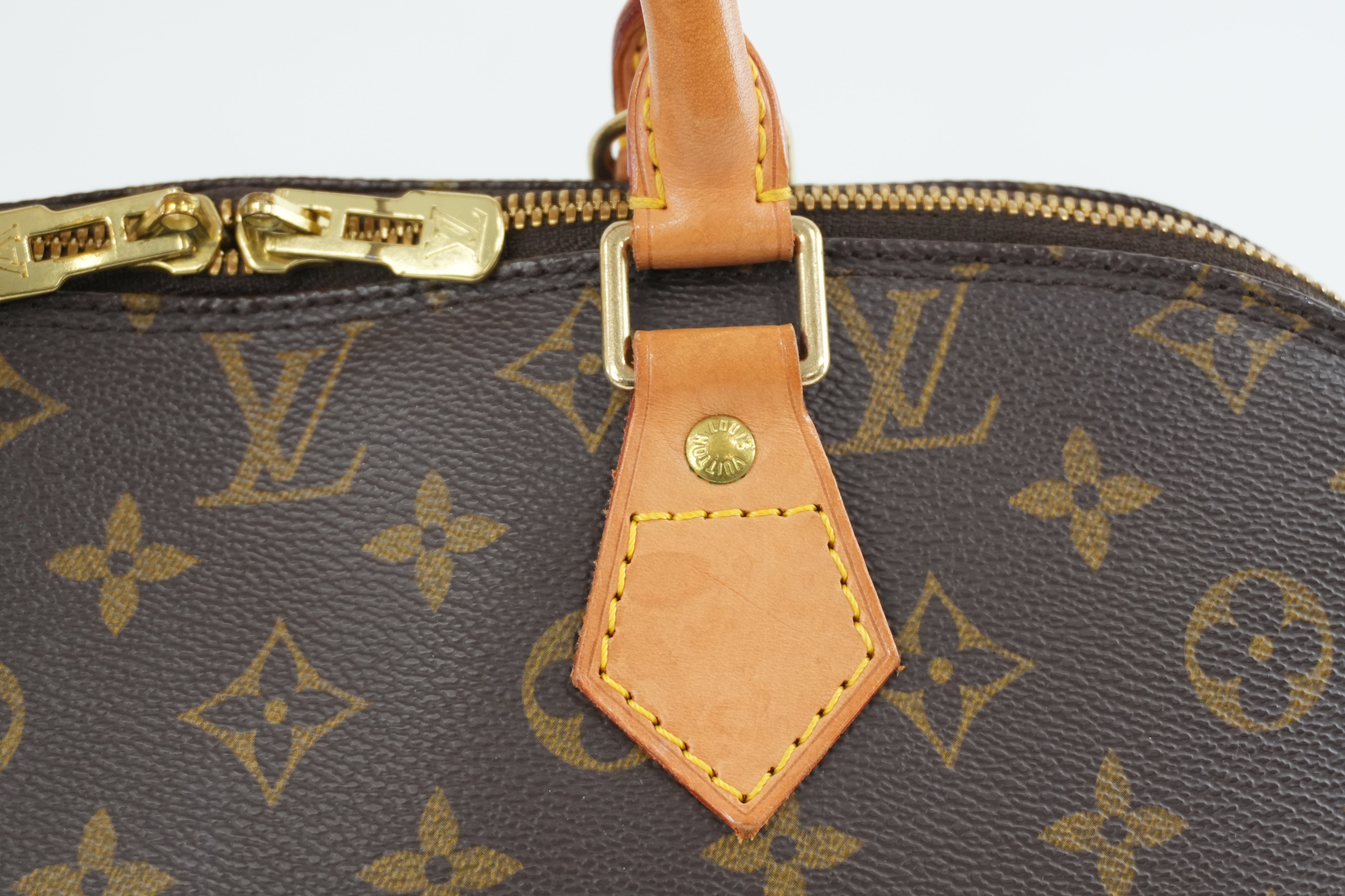 Louis Vuitton Monogram Alma PM Handbag Used