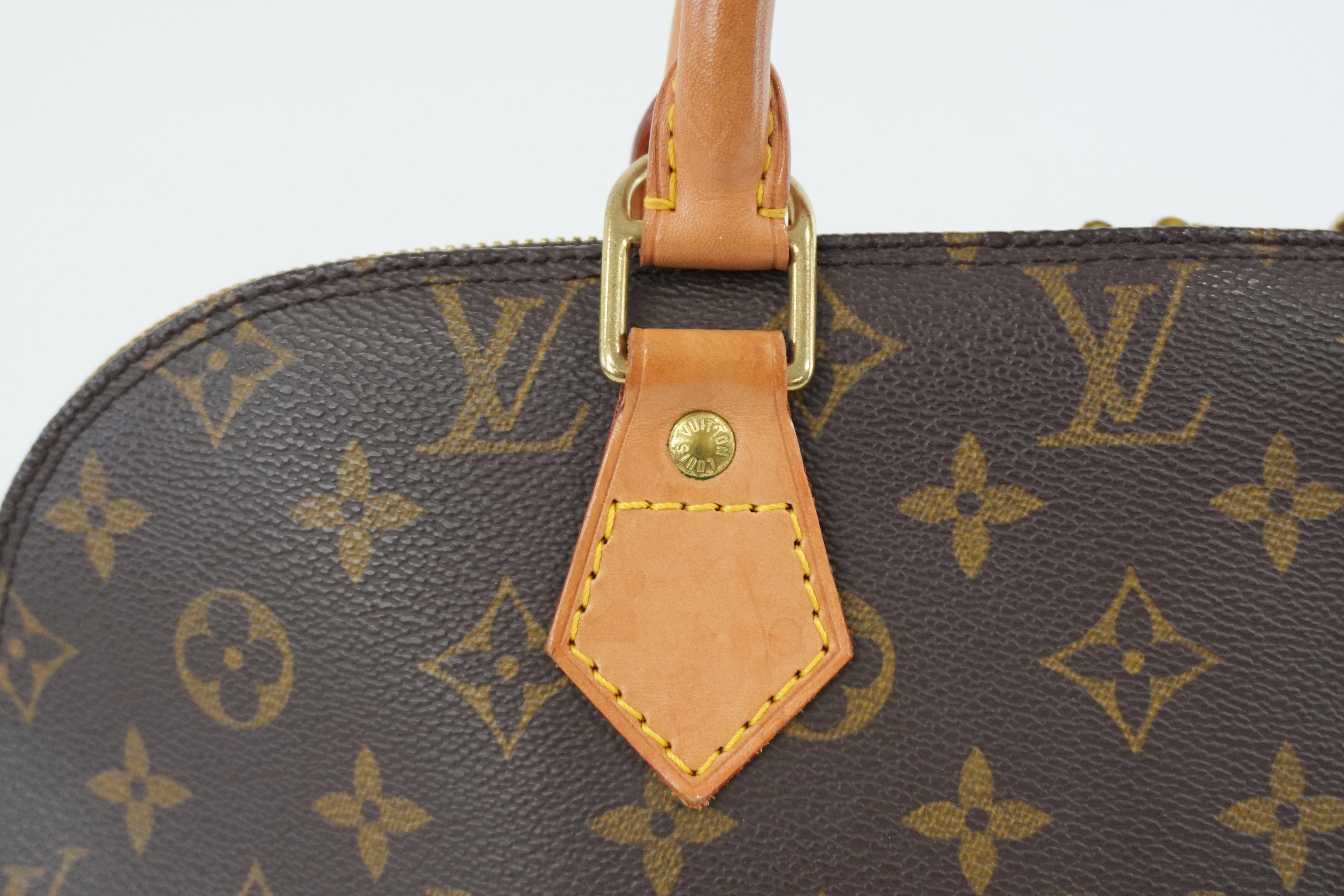 Louis Vuitton Monogram Alma PM Handbag Used