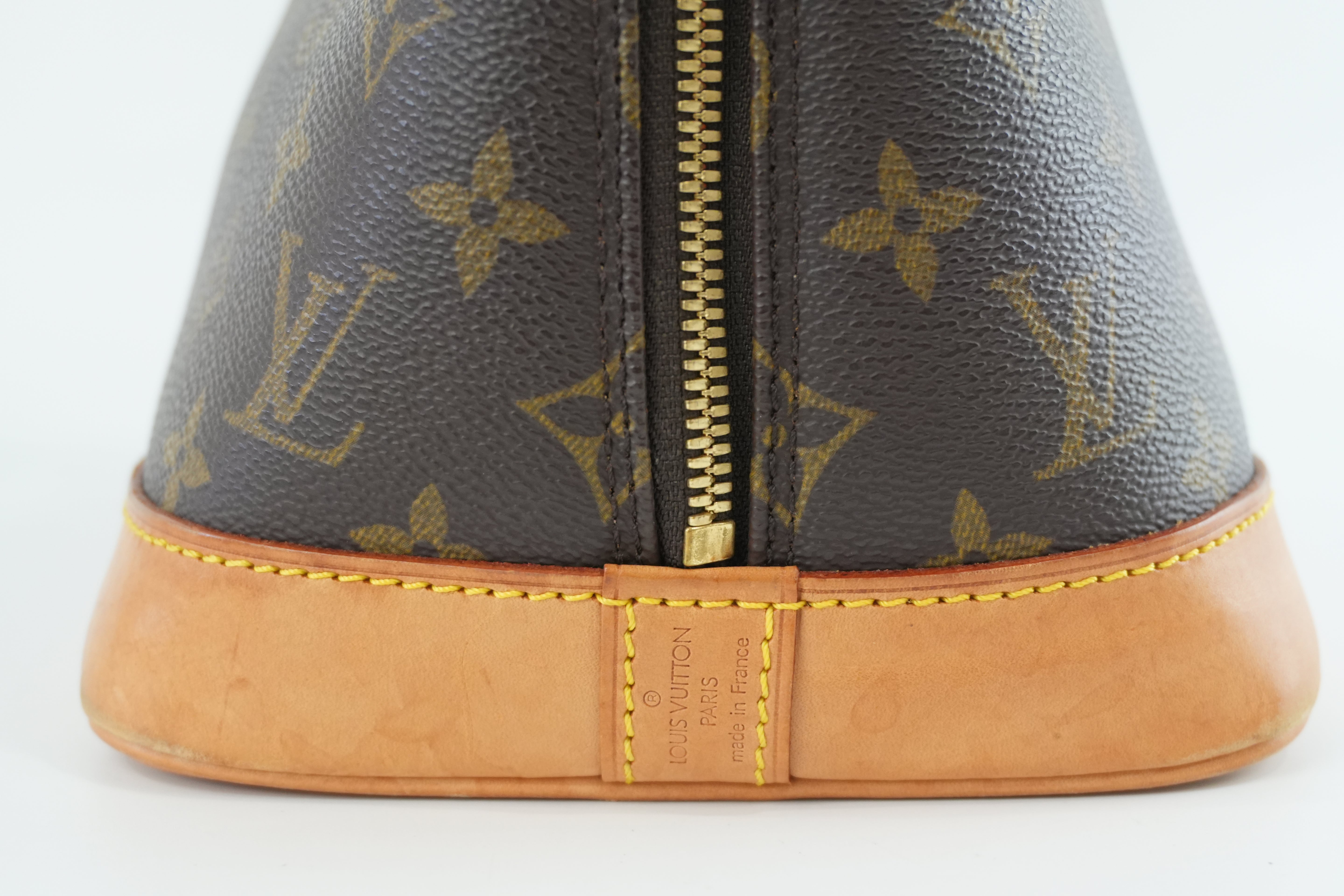 Louis Vuitton Monogram Alma PM Handbag Used