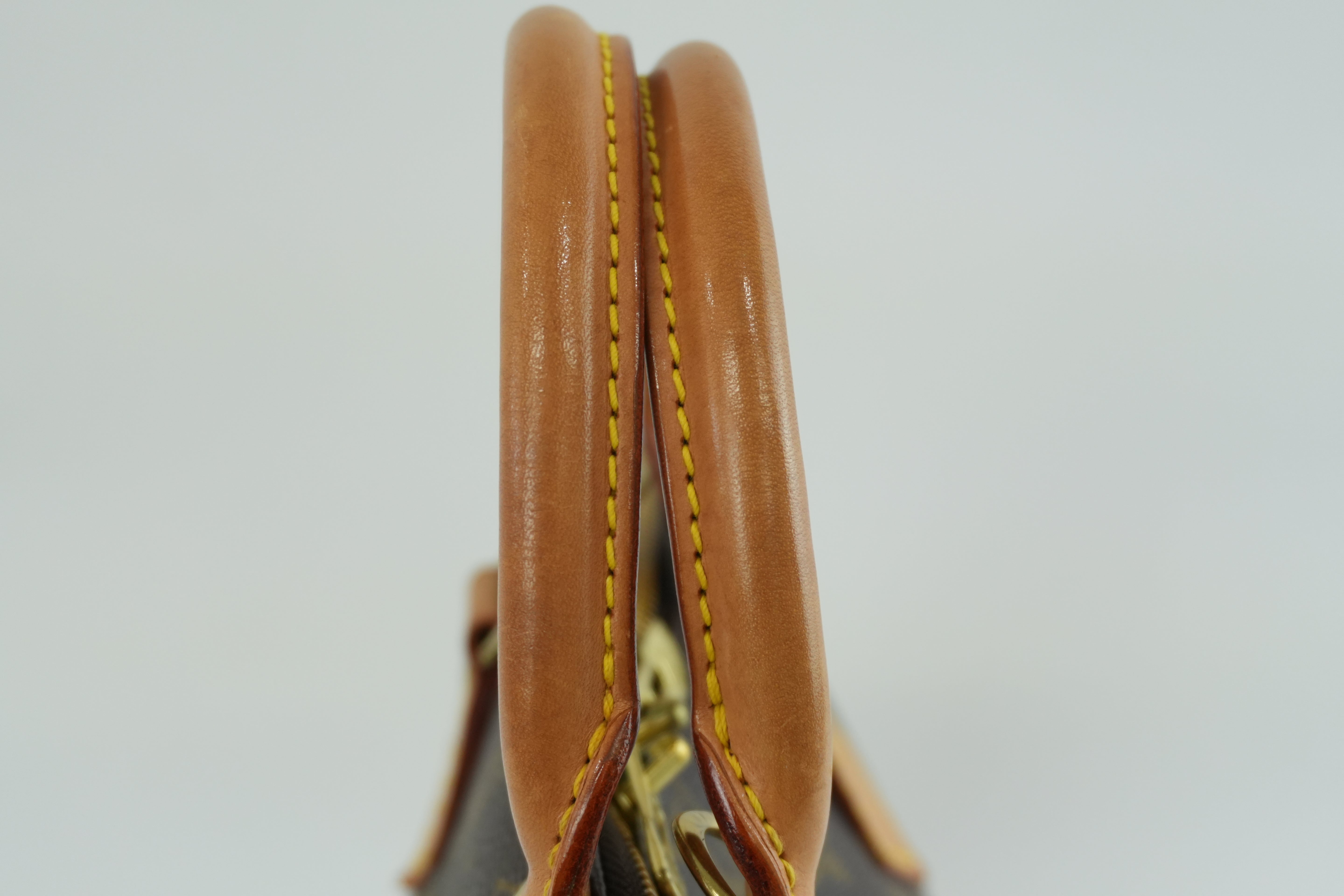 Louis Vuitton Monogram Alma PM Handbag Used