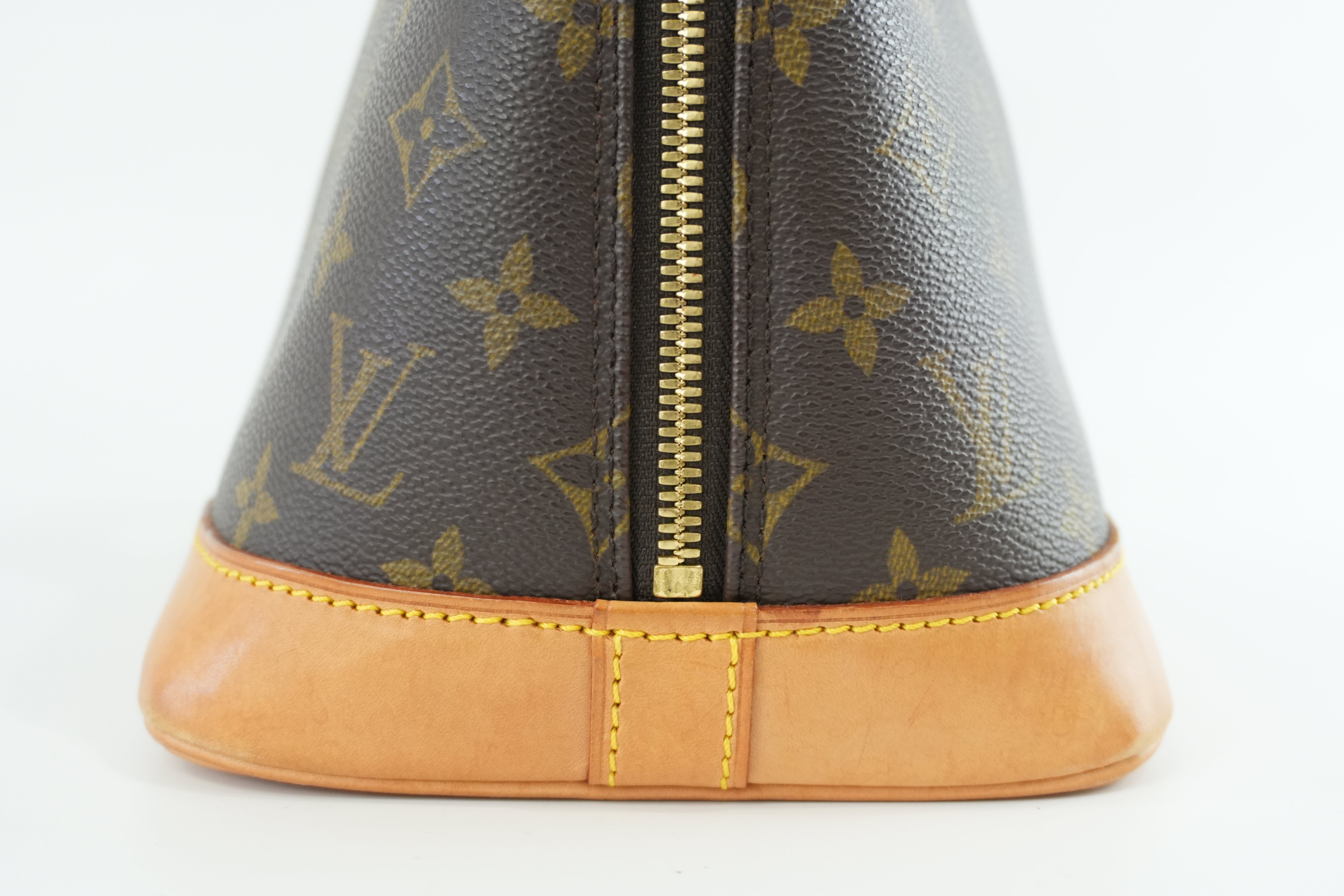 Louis Vuitton Monogram Alma PM Handbag Used