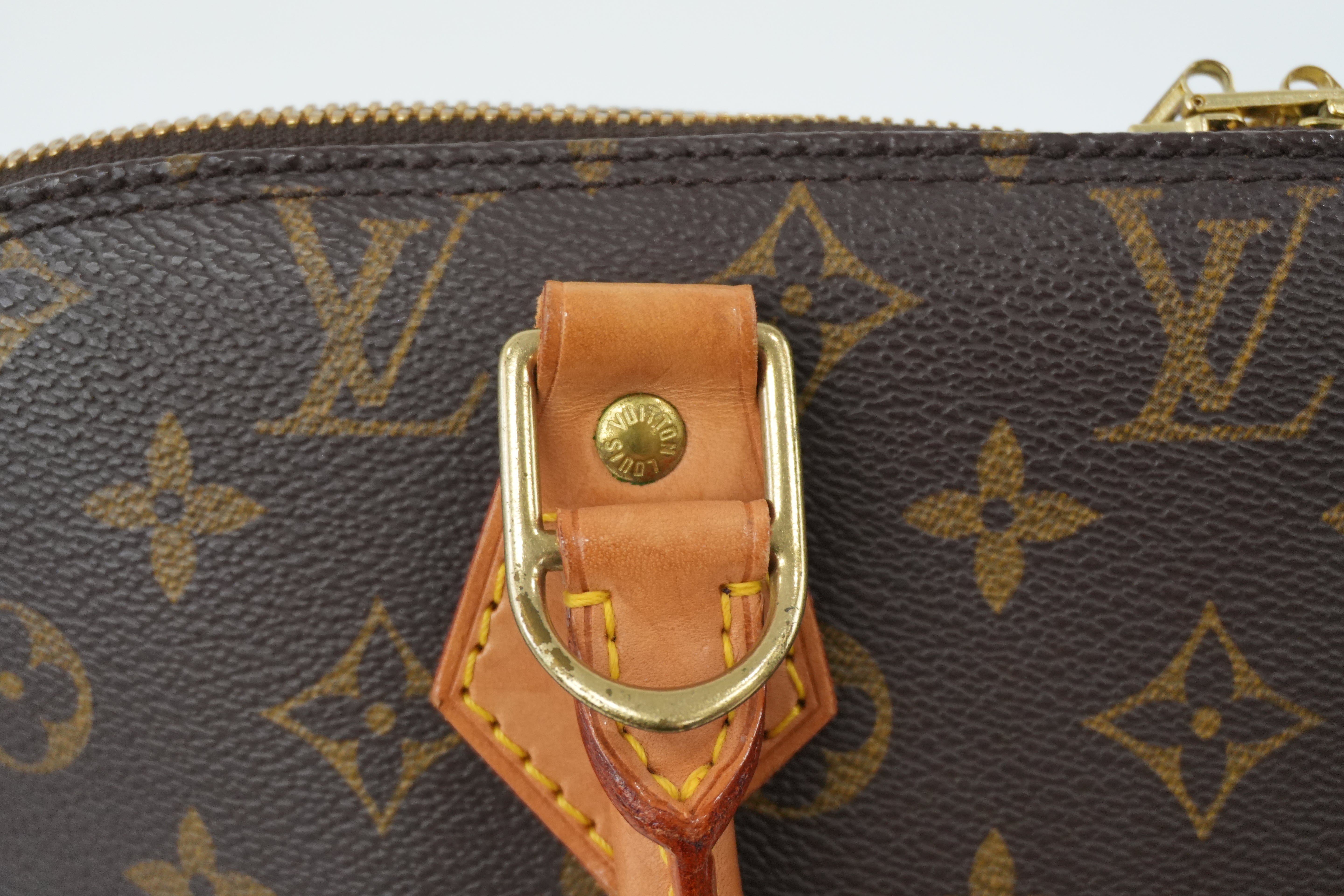 Louis Vuitton Monogram Alma PM Handbag Used