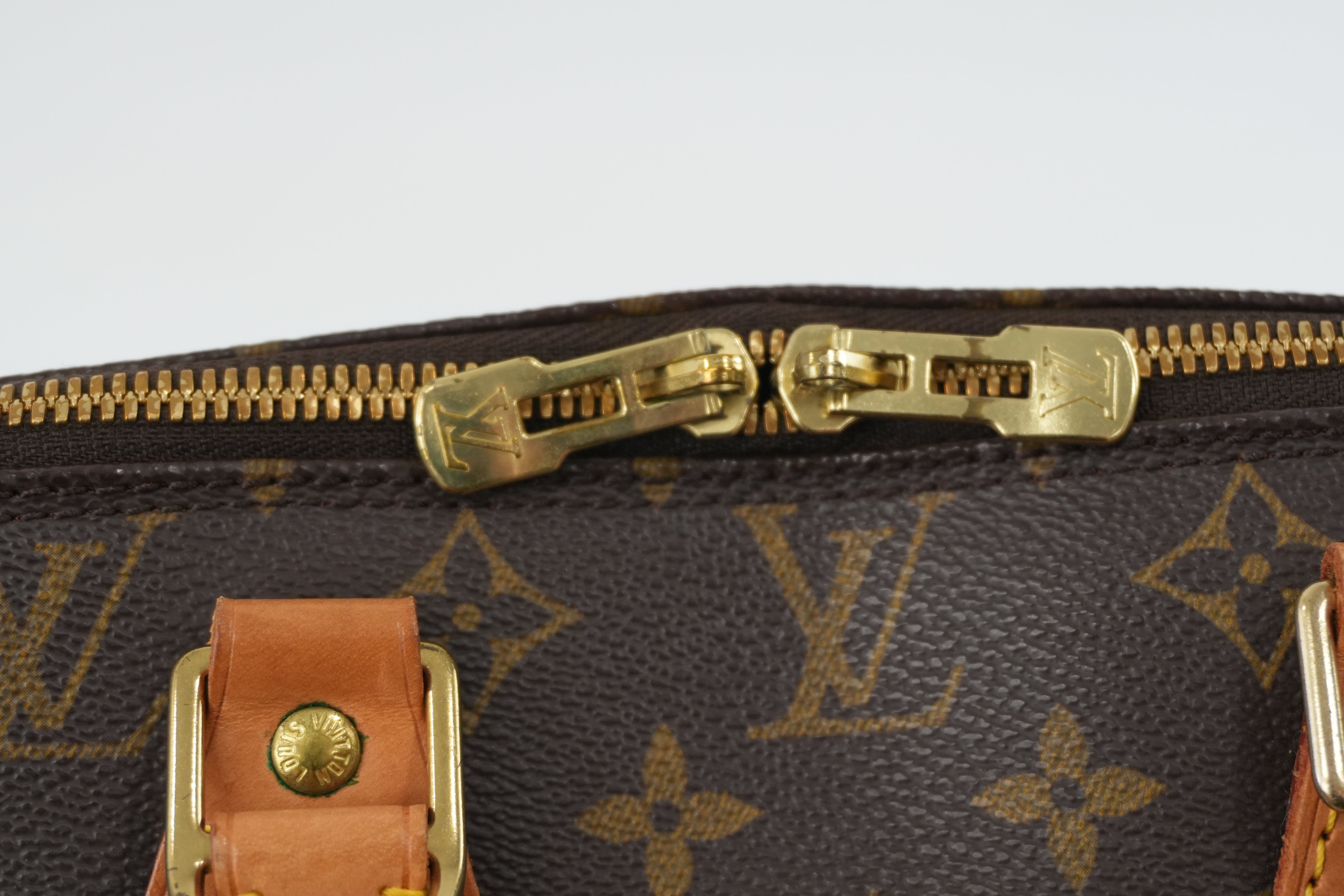 Louis Vuitton Monogram Alma PM Handbag Used