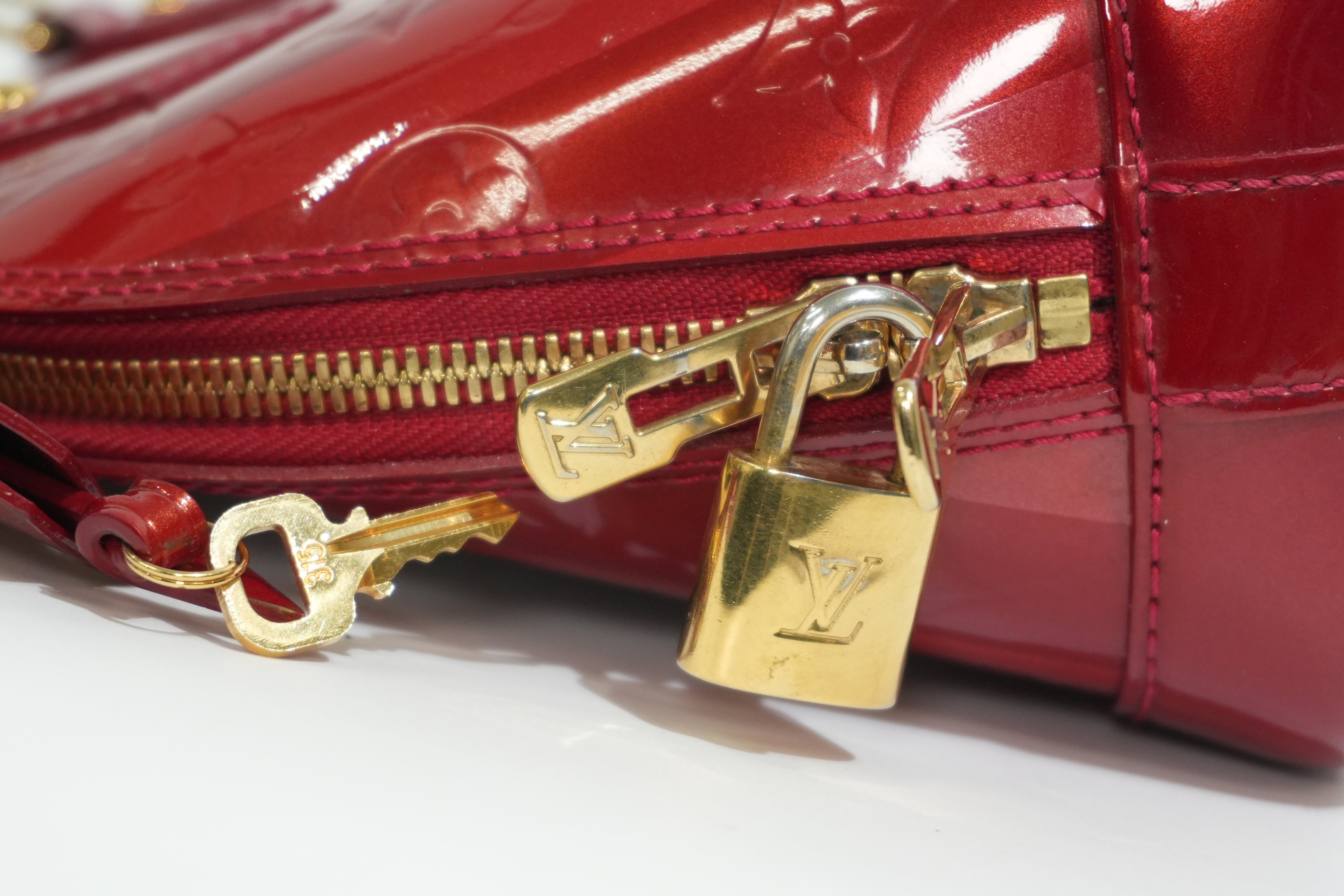 Pre-owned Louis Vuitton Vernis Alma BB Rayures Shoulder Bag Red