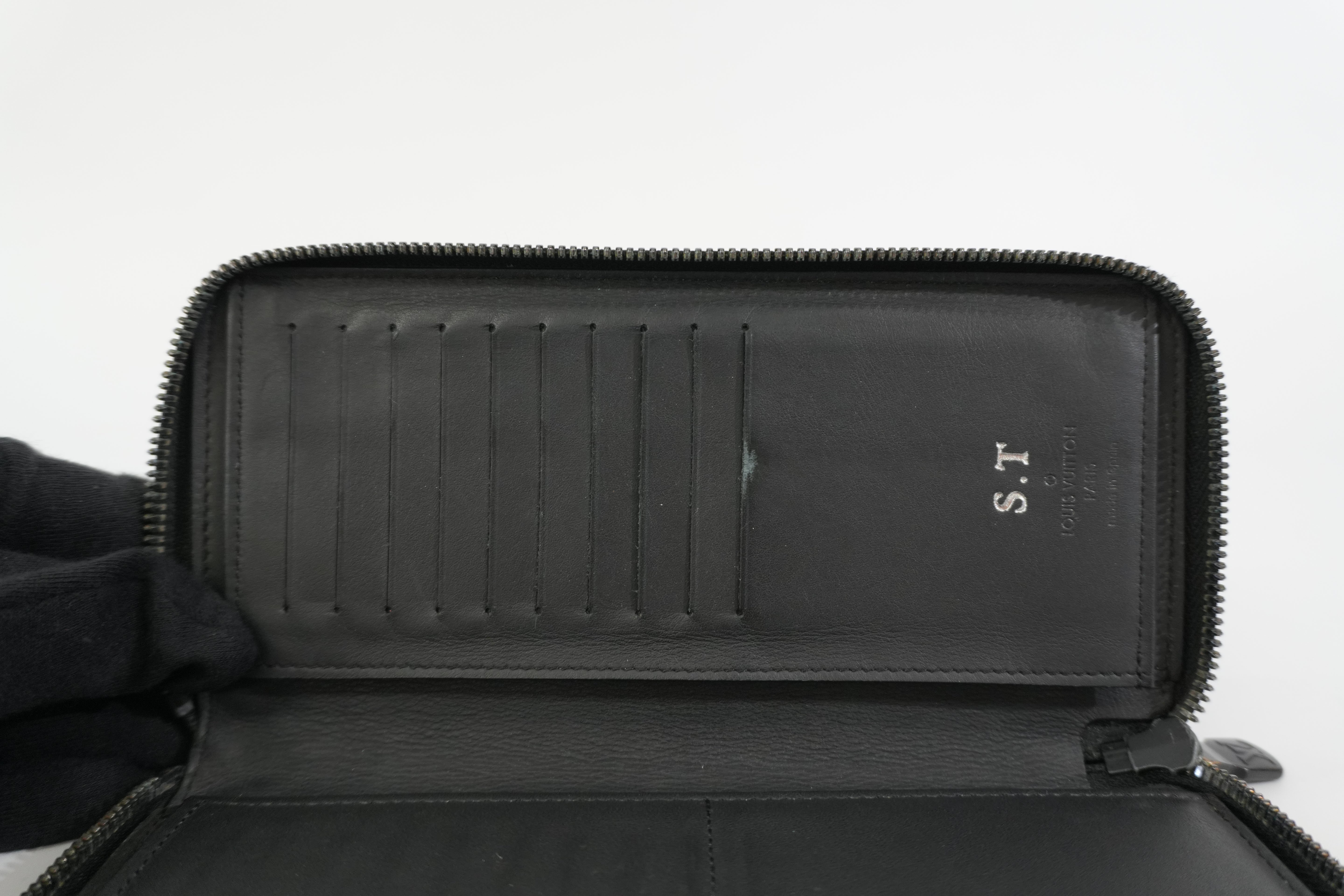 Pre-owned Louis Vuitton Shadow Monogram Vertical Zippy Wallet Black